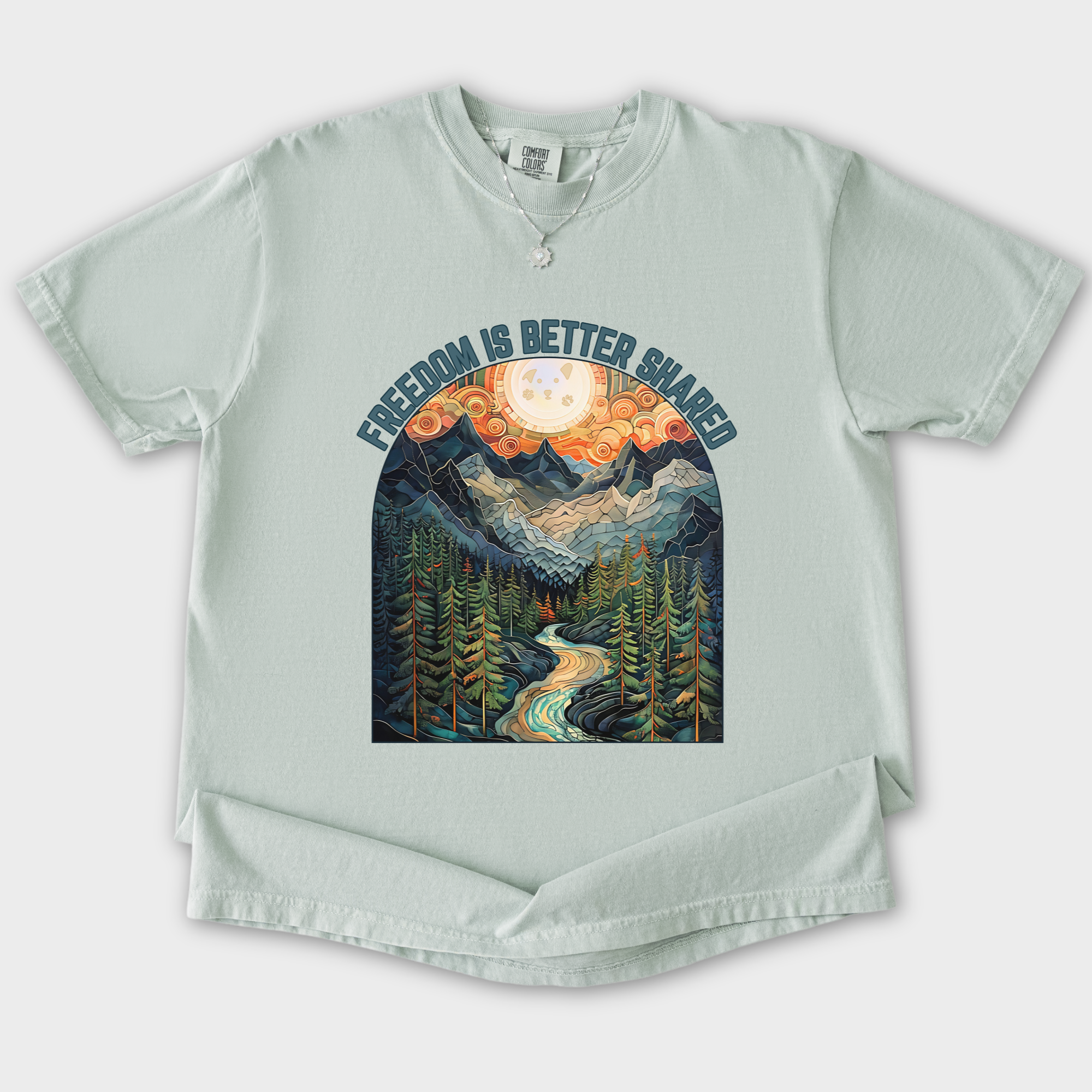 artistic-mountain-freedom-is-better-shared-stained-glass-version-dog-graphic-comfort-colors-t-shirt-in-granite - Granite Flat Lay Front