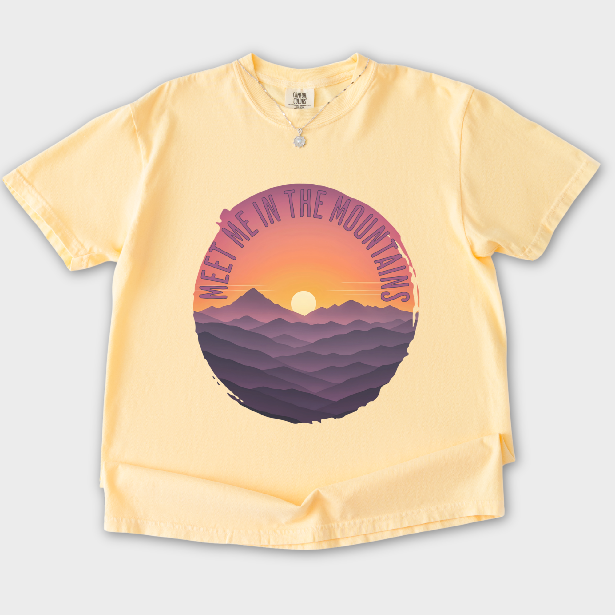 artistic-meet-me-in-the-mountains-version-ii-pet-graphic-comfort-colors-t-shirt-in-butter - Butter Flat Lay Front