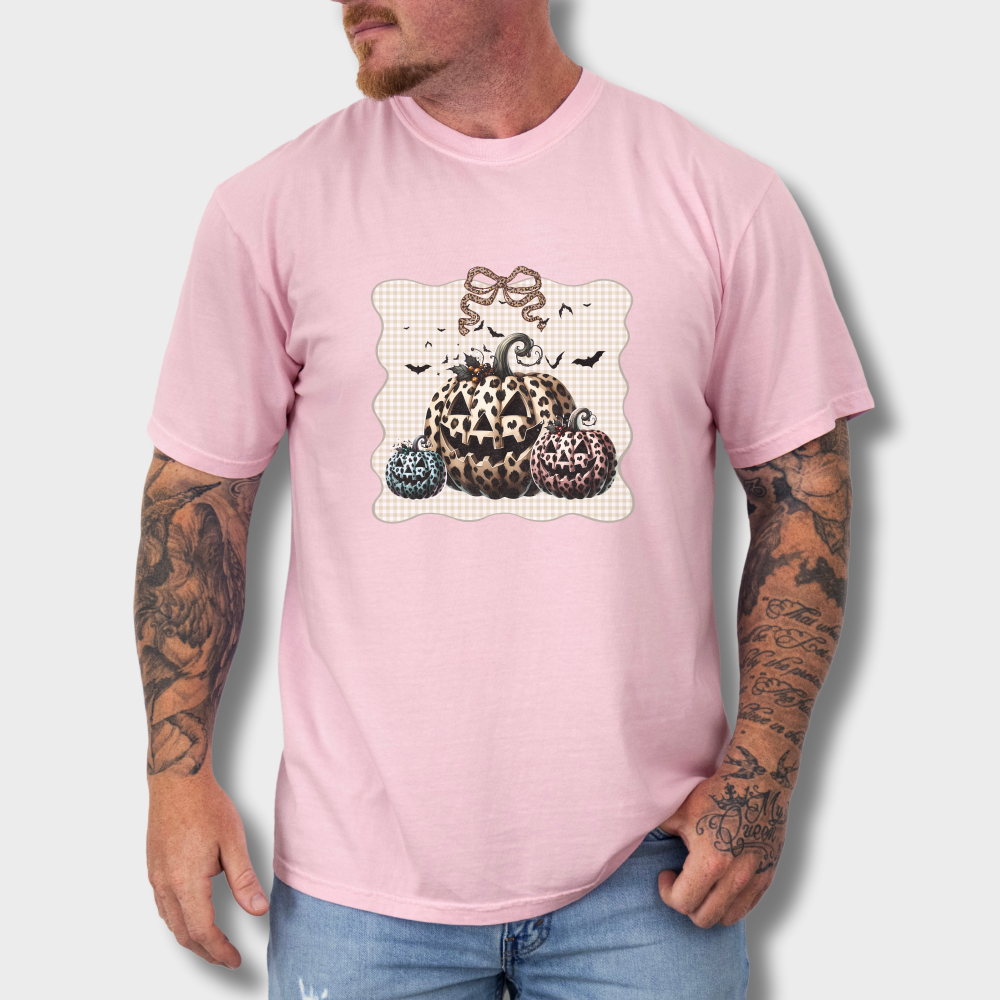 western-preppy-leopard-print-jack-o-lanterns-cat-bow-comfort-colors-t-shirt-in-blossom - Blossom Lifestyle Male Model