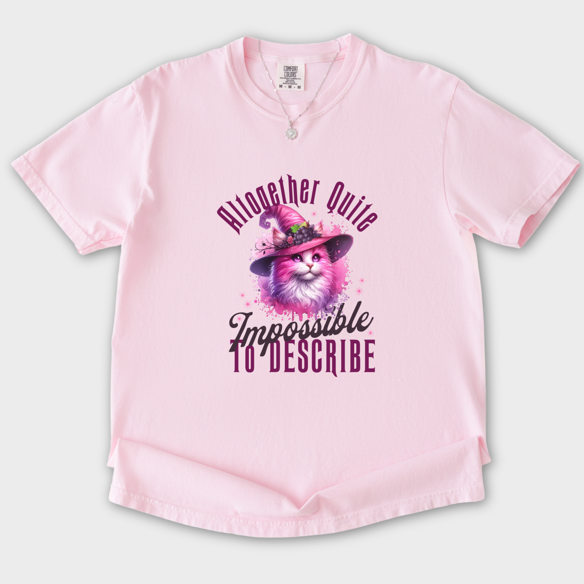 pink-wicked-impossible-to-describe-t-shirt-1-in-blossom - Blossom Flat Lay Front