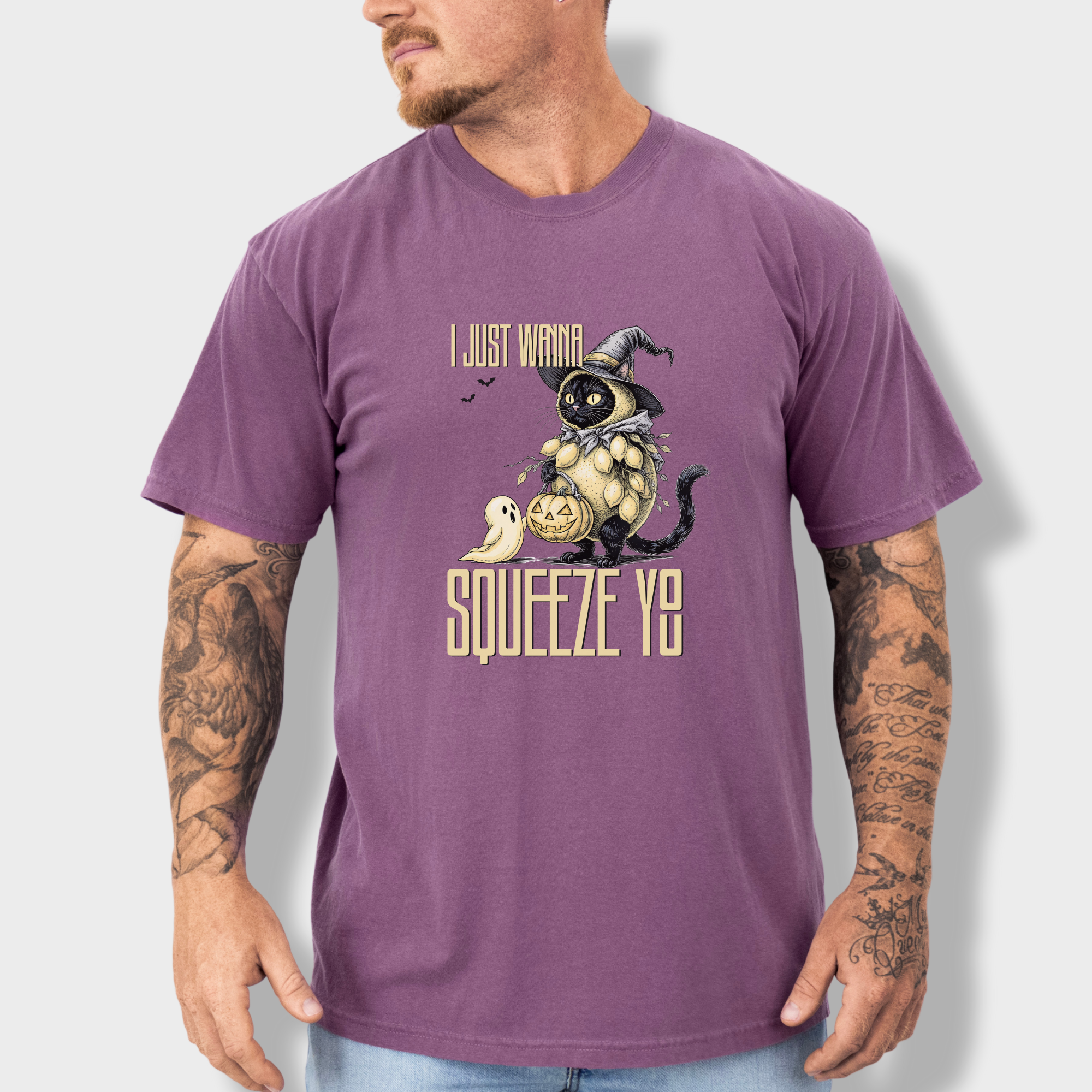 line-art-i-just-wanna-squeeze-you-lemon-trick-or-treater-cat-graphic-comfort-colors-t-shirt-in-berry - Berry Lifestyle Male Model