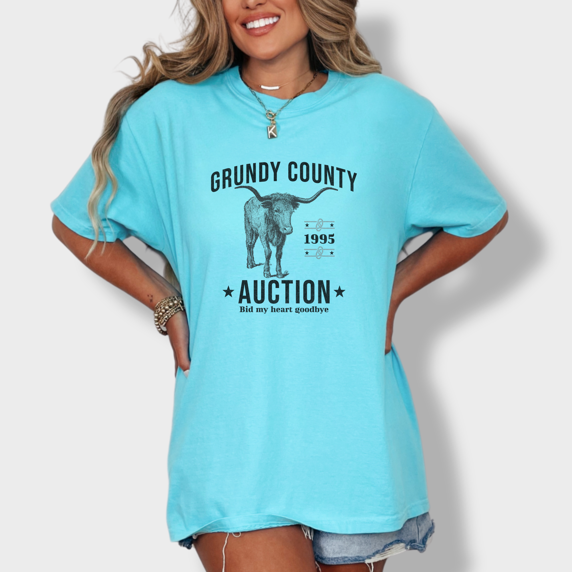 western-grundy-county-auction-animal-line-art-comfort-colors-t-shirt-in-lagoon-blue - Lagoon Blue Lifestyle Female Model