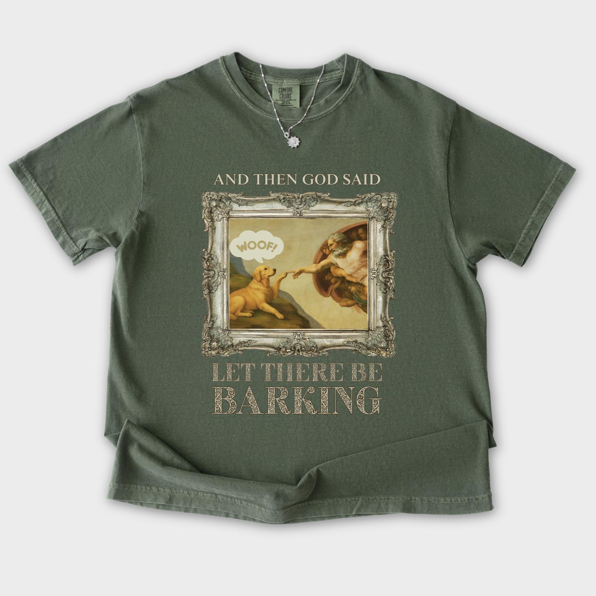 vintage-let-there-be-barking-dog-graphic-comfort-colors-t-shirt-in-moss - Moss Flat Lay Front