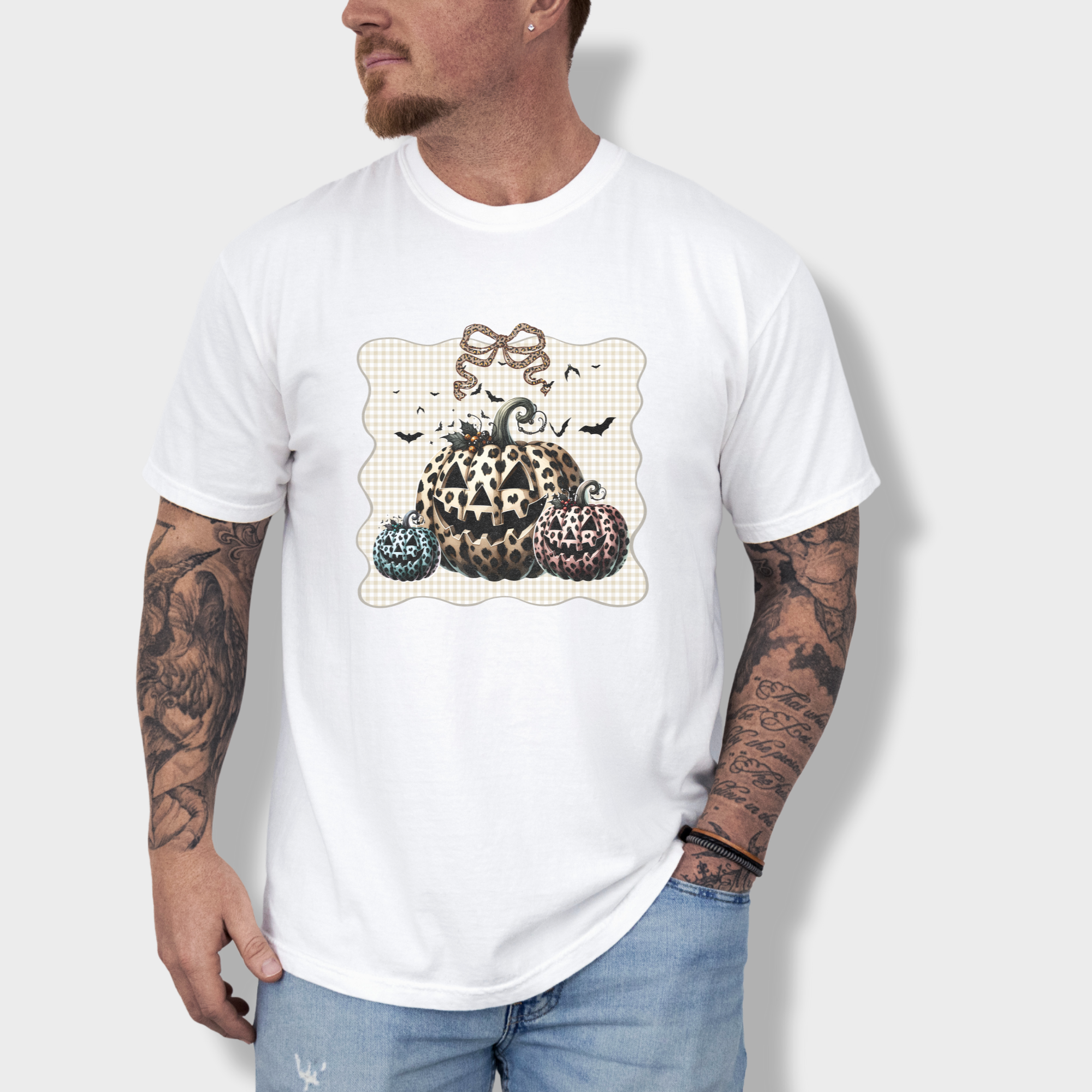 western-preppy-leopard-print-jack-o-lanterns-cat-bow-comfort-colors-t-shirt-in-white - White Lifestyle Male Model