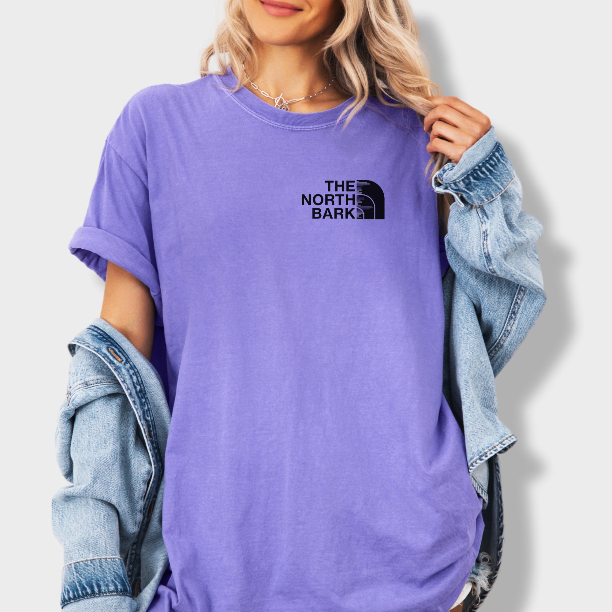 artistic-the-north-bark-dog-graphic-comfort-colors-t-shirt-in-violet - Violet Lifestyle Female Model