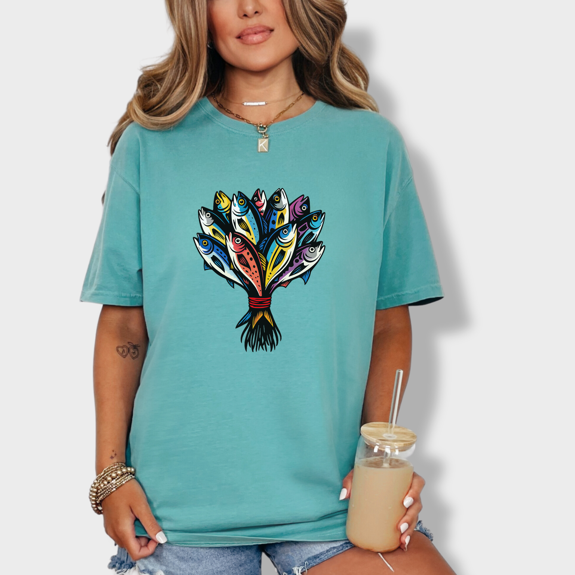 artistic-fish-bouquet-a-cats-dream-cat-graphic-comfort-colors-t-shirt-in-seafoam - Seafoam Lifestyle Female Model