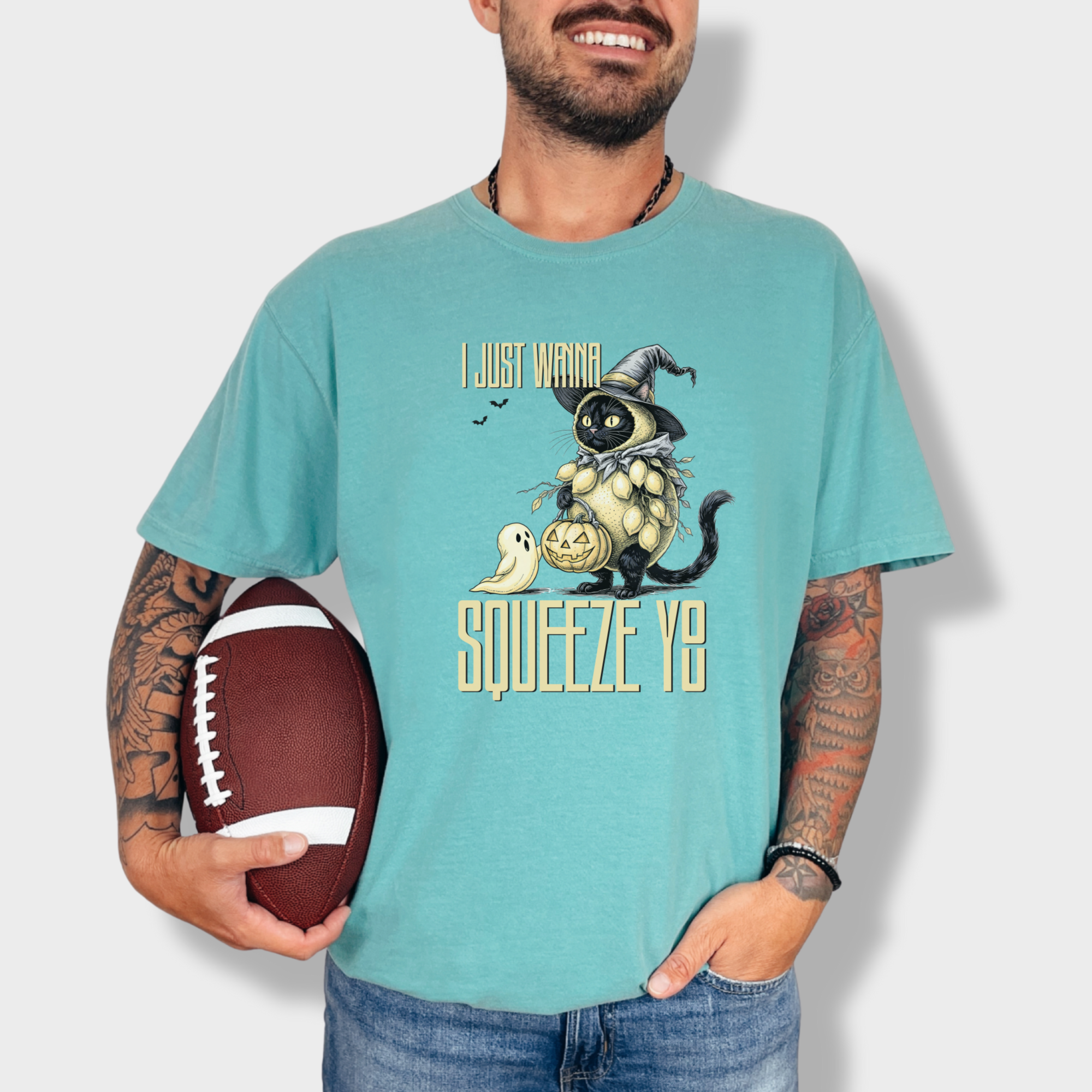 line-art-i-just-wanna-squeeze-you-lemon-trick-or-treater-cat-graphic-comfort-colors-t-shirt-in-seafoam - Seafoam Lifestyle Male Model