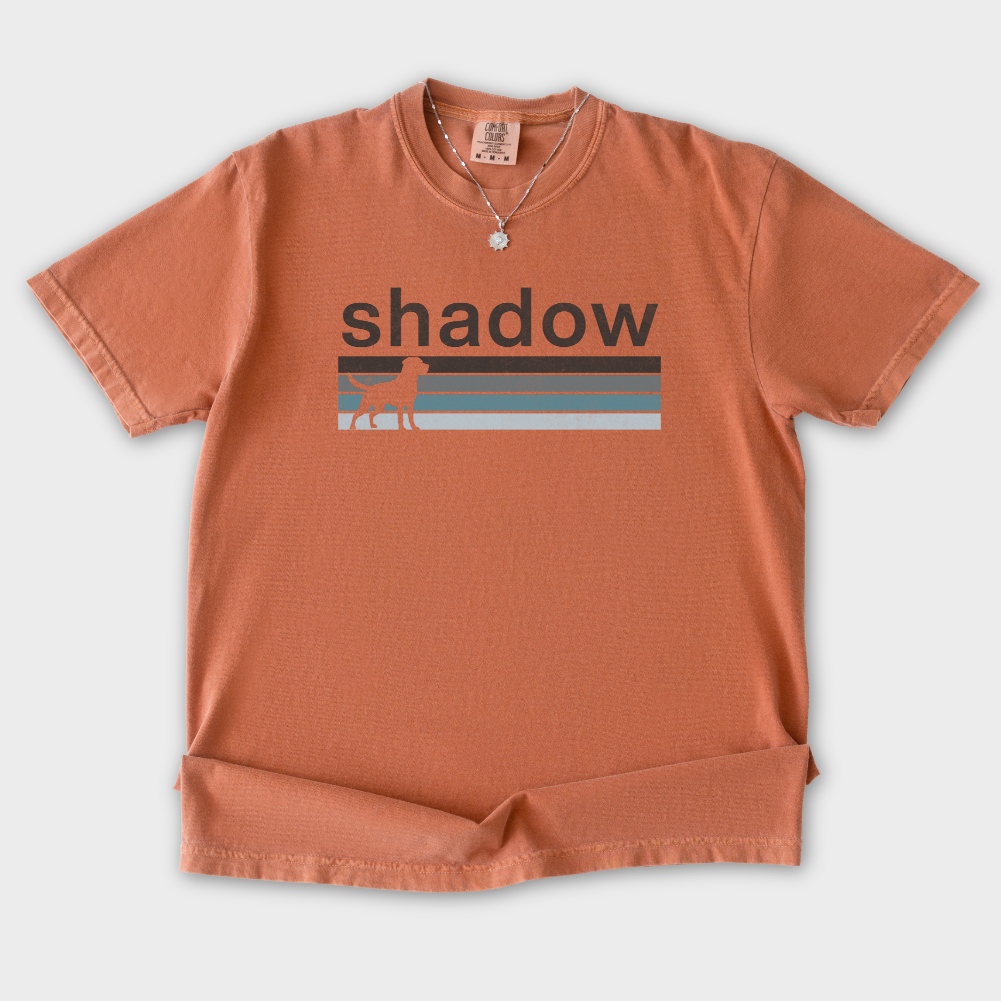 retro-dog-shadow-dog-text-comfort-colors-t-shirt-in-yam - Yam Flat Lay Front