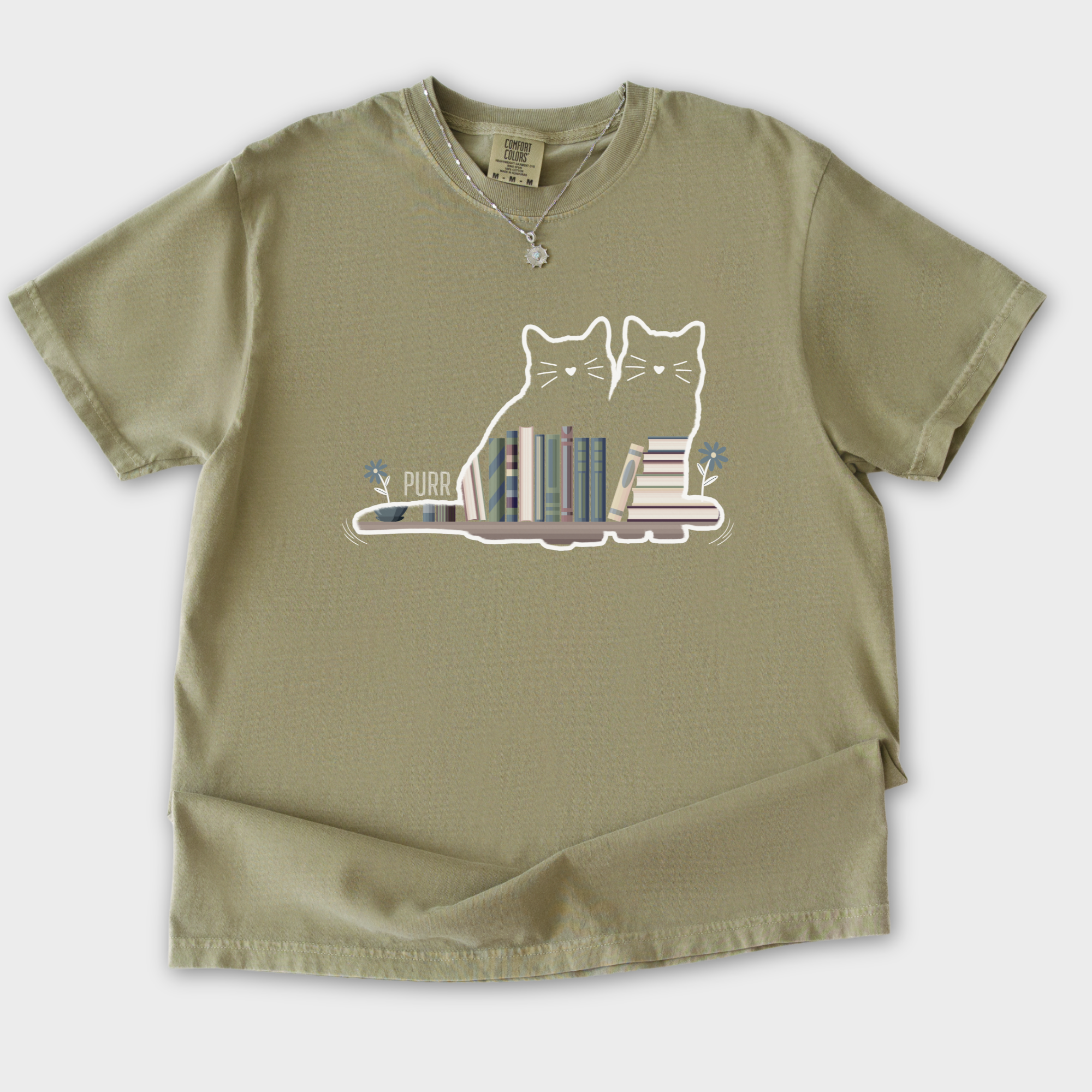 vintage-cat-book-shelf-purr-cat-graphic-comfort-colors-t-shirt-in-khaki - Khaki Flat Lay Front