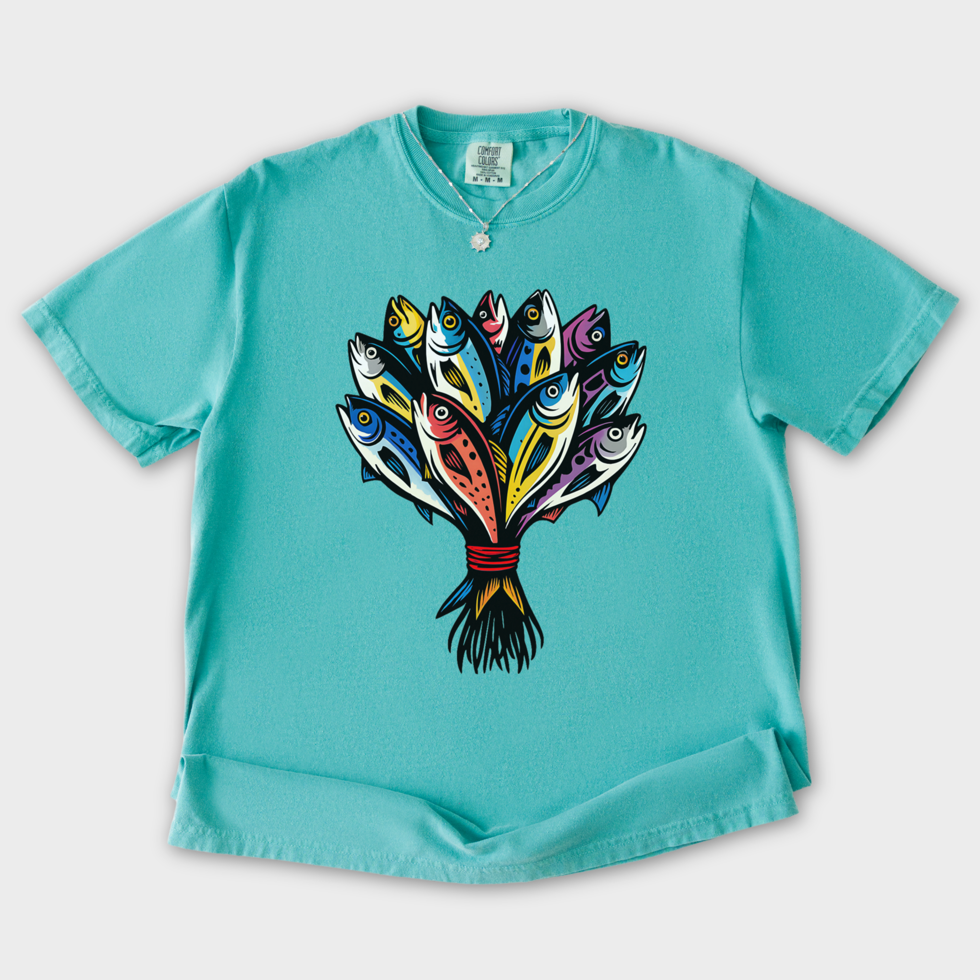 artistic-fish-bouquet-a-cats-dream-cat-graphic-comfort-colors-t-shirt-in-seafoam - Seafoam Flat Lay Front