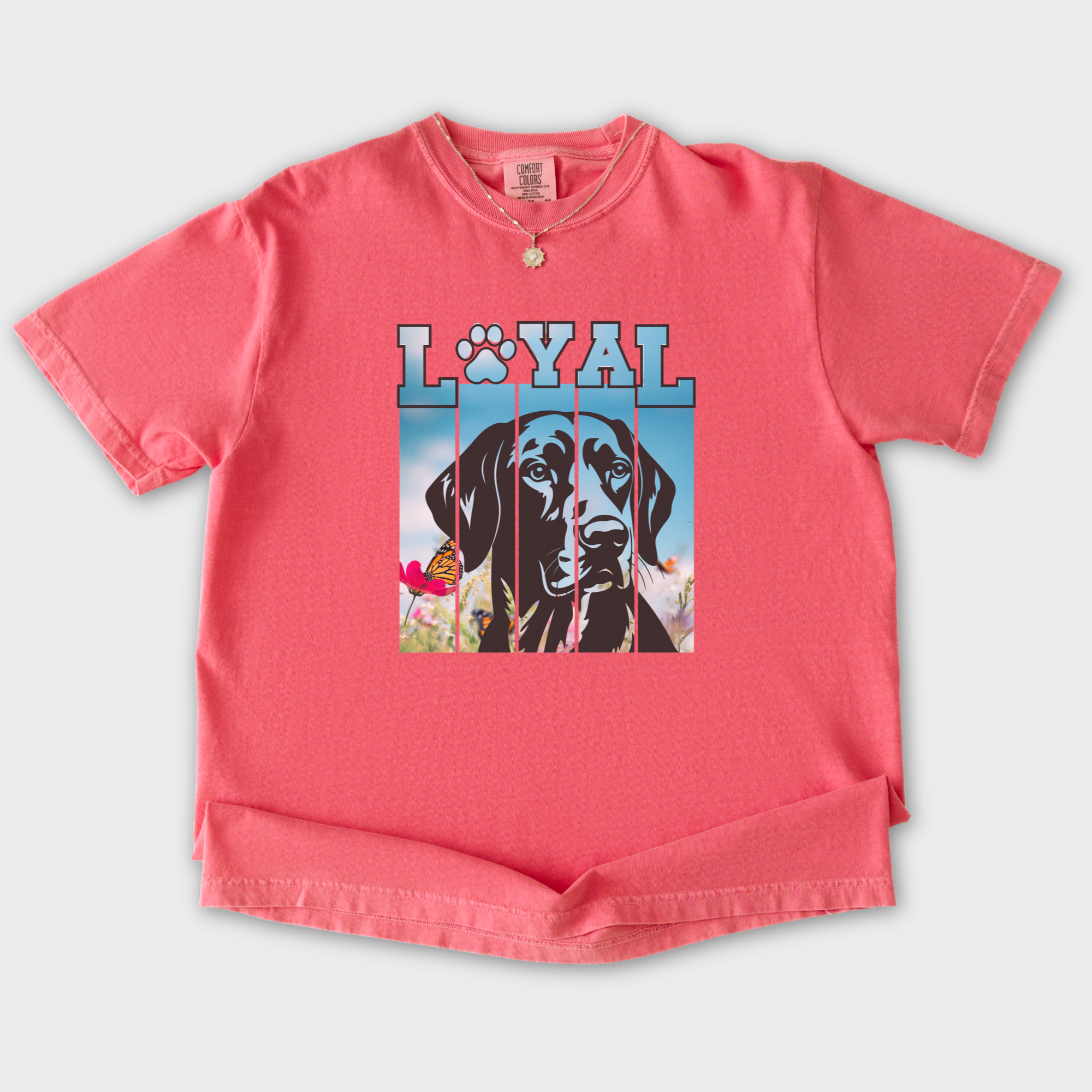 artistic-loyal-dog-graphic-comfort-colors-t-shirt-in-watermelon - Watermelon Flat Lay Front