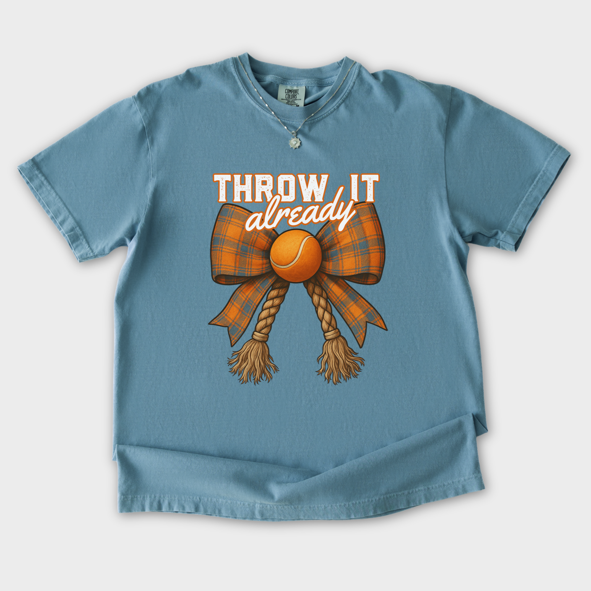 western-throw-it-already-dog-chew-toy-bow-dog-bow-comfort-colors-t-shirt-in-ice-blue - Ice Blue Flat Lay Front