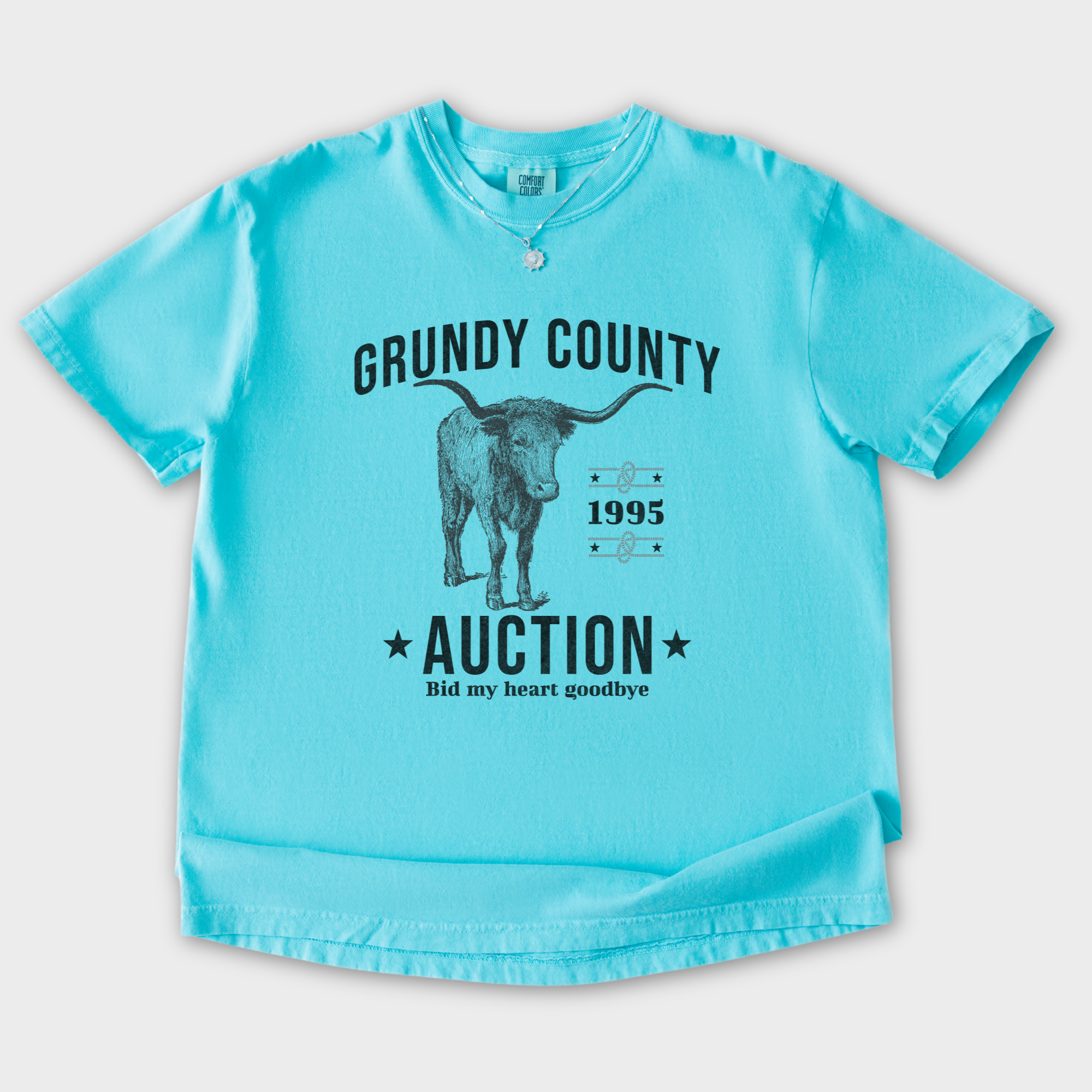 western-grundy-county-auction-animal-line-art-comfort-colors-t-shirt-in-lagoon-blue - Lagoon Blue Flat Lay Front