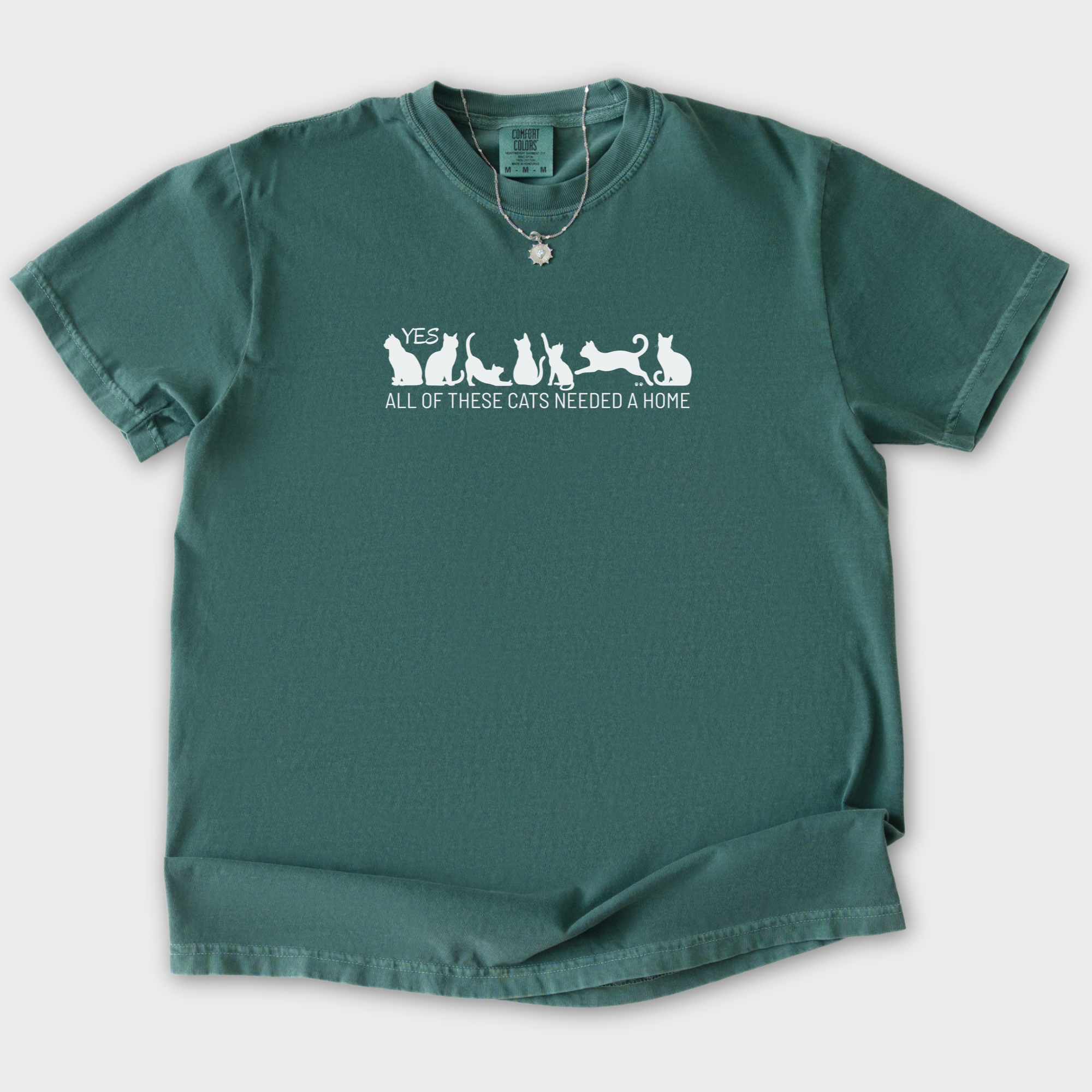 fetch-n-found  unisex tee for men and women featuring , Yes all of these cats needed a home Blue Spruce graphic T-Shirt made of 100% cotton - Blue Spruce Flat Lay Front