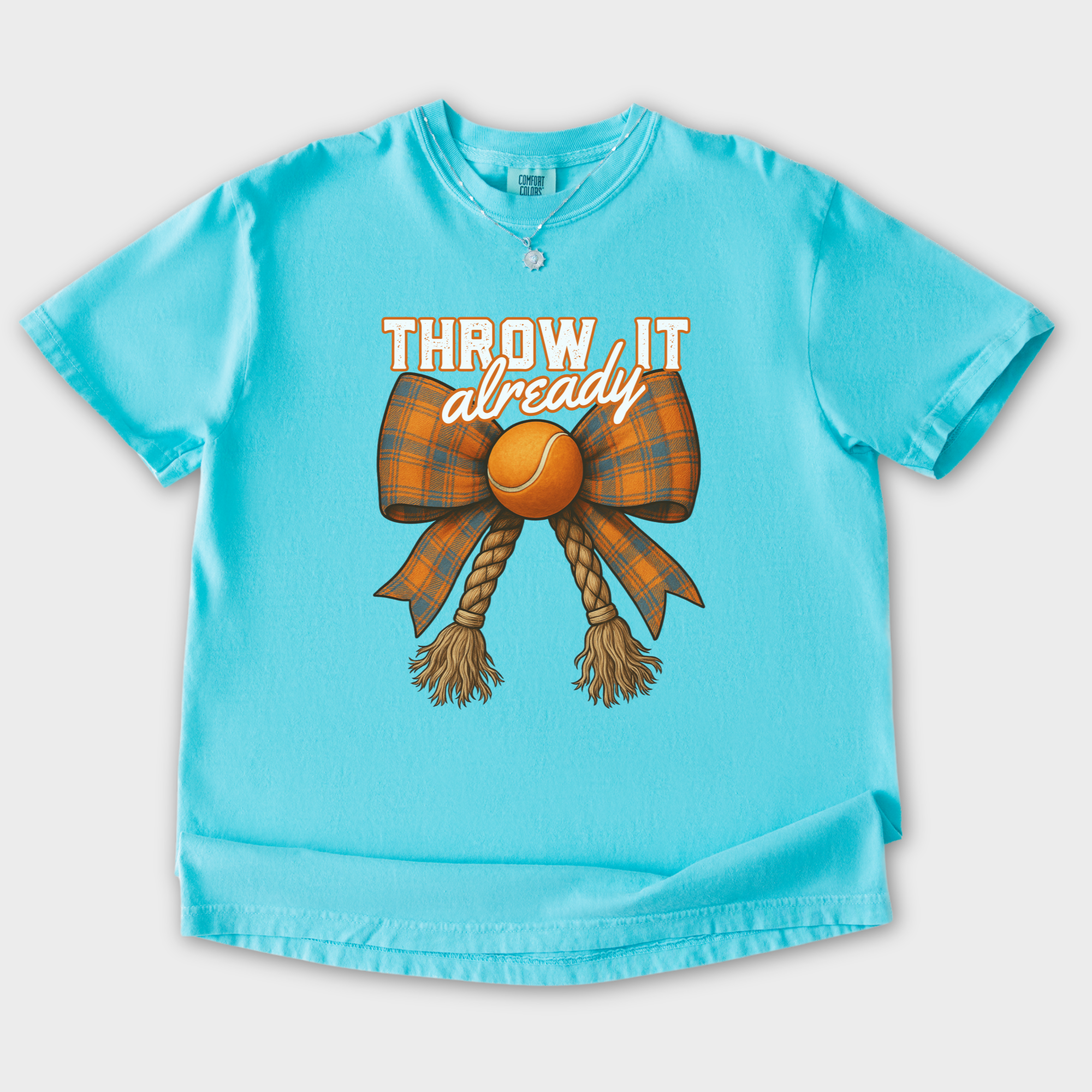 western-throw-it-already-dog-chew-toy-bow-dog-bow-comfort-colors-t-shirt-in-lagoon-blue - Lagoon Blue Flat Lay Front