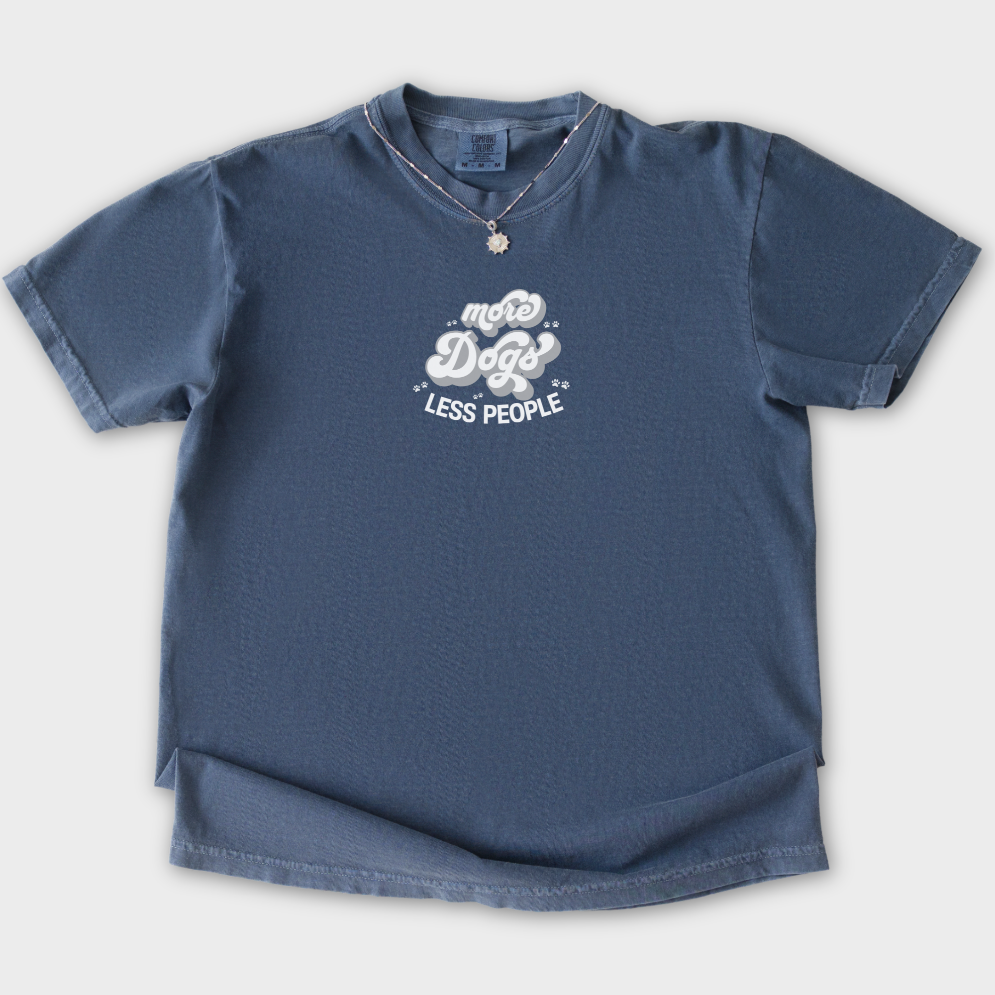 vintage-less-people-more-dogs-dog-text-comfort-colors-t-shirt-in-denim - Denim Flat Lay Front