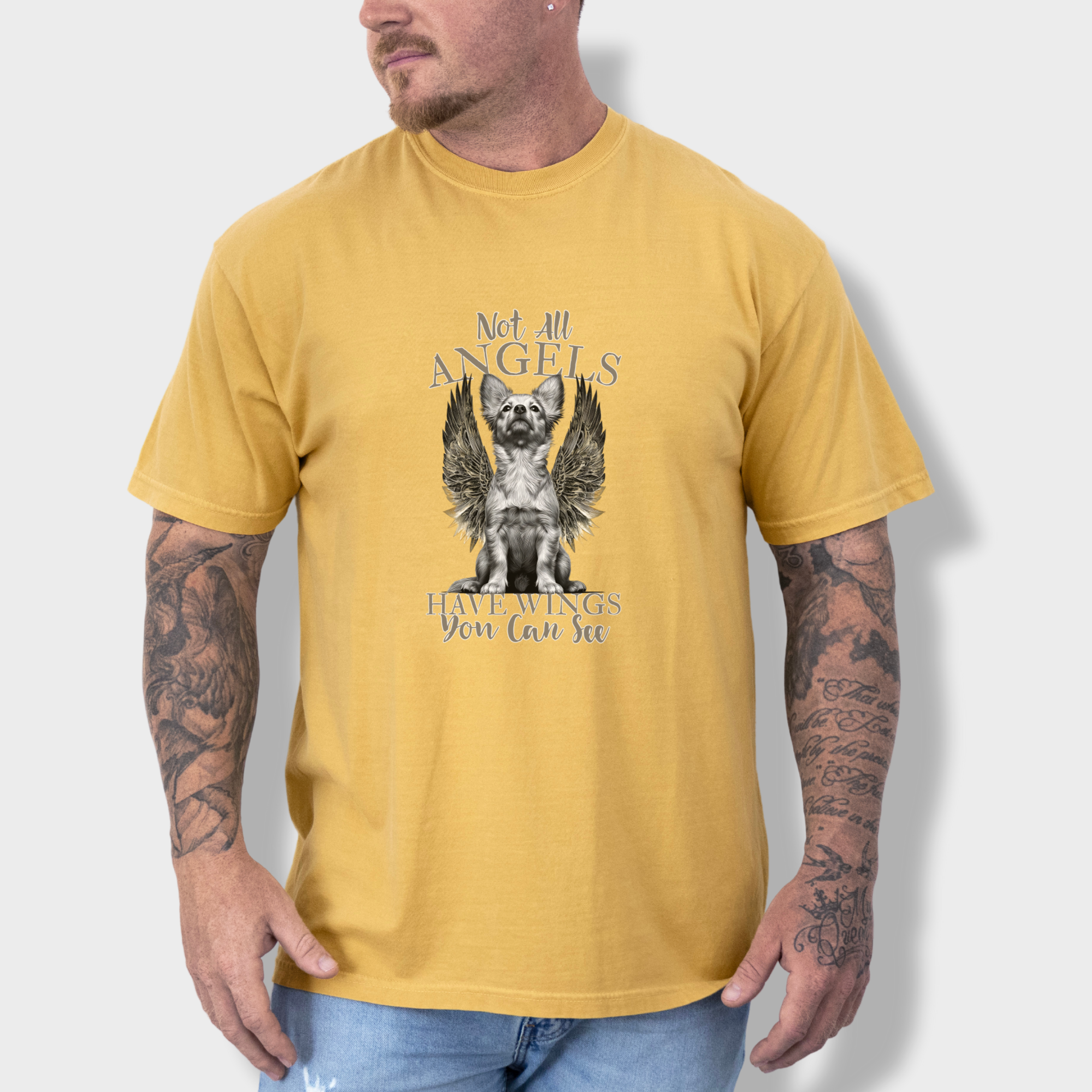 artistic-not-all-angels-have-wings-you-can-see-dog-graphic-comfort-colors-t-shirt-in-mustard - Mustard Lifestyle Male Model