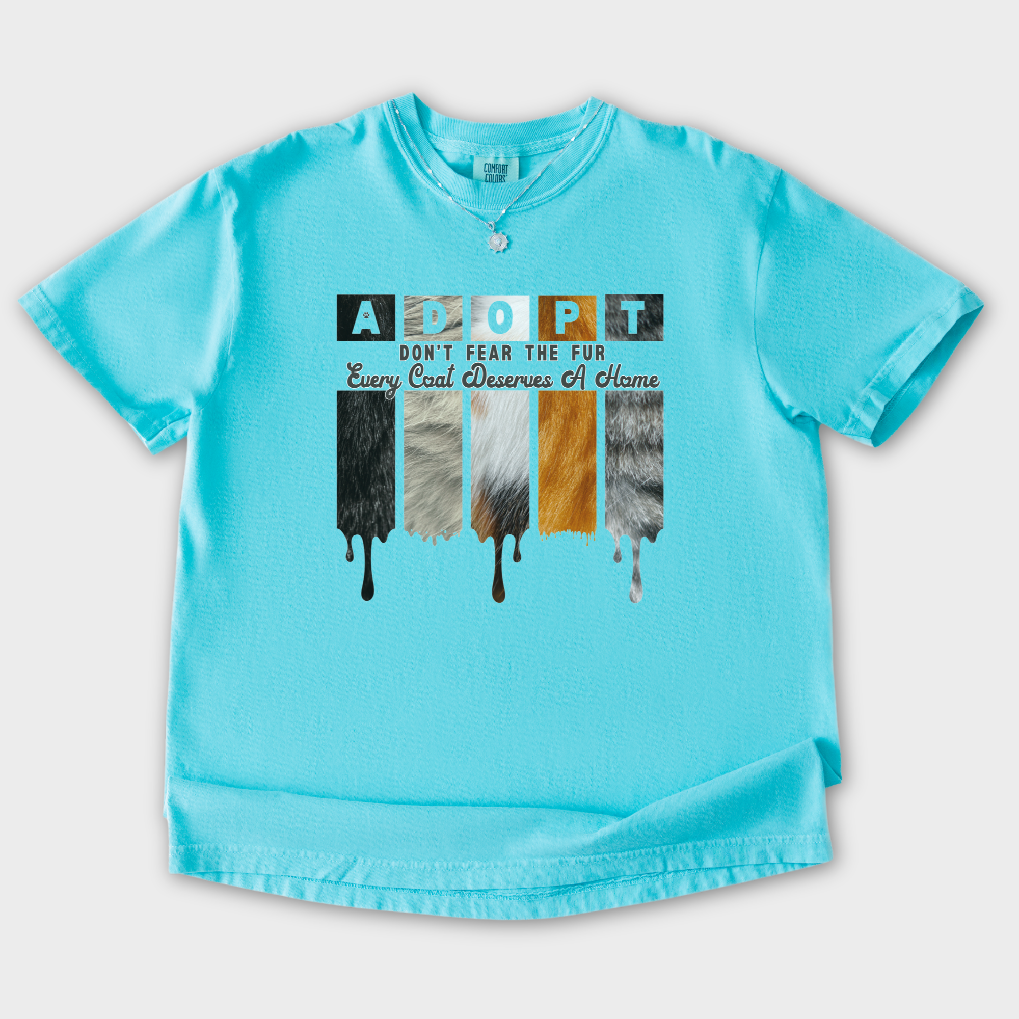 retro-adopt-every-coat-deserves-a-home-cat-minimalist-comfort-colors-t-shirt-in-lagoon-blue - Lagoon Blue Flat Lay Front