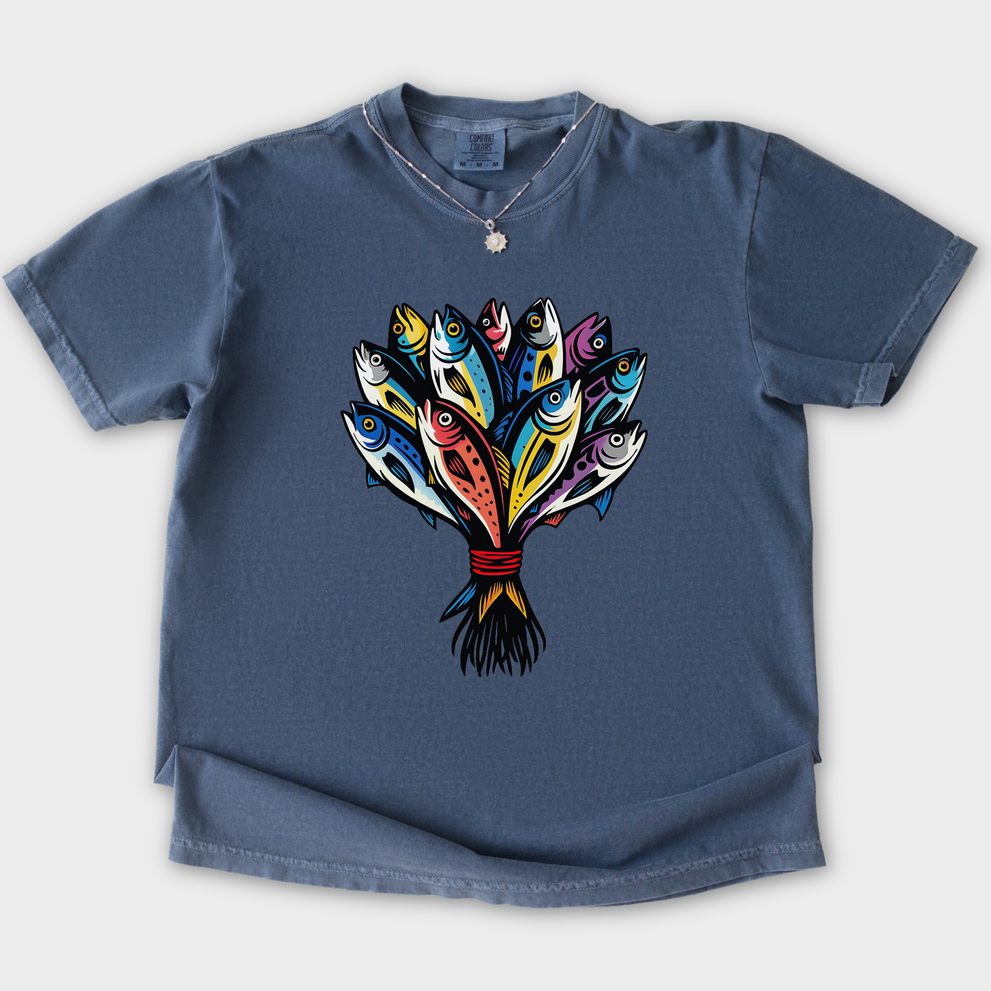 artistic-fish-bouquet-a-cats-dream-cat-graphic-comfort-colors-t-shirt-in-denim - Denim Flat Lay Front