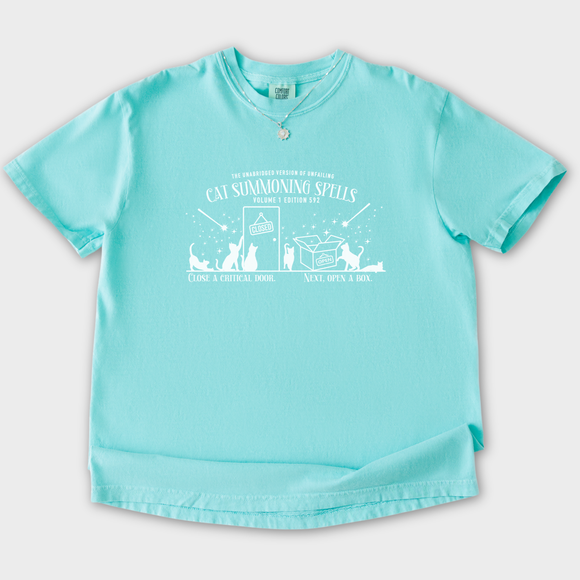 cat-summoning-spells-t-shirt-in-chalky-mint - Chalky Mint Flat Lay Front
