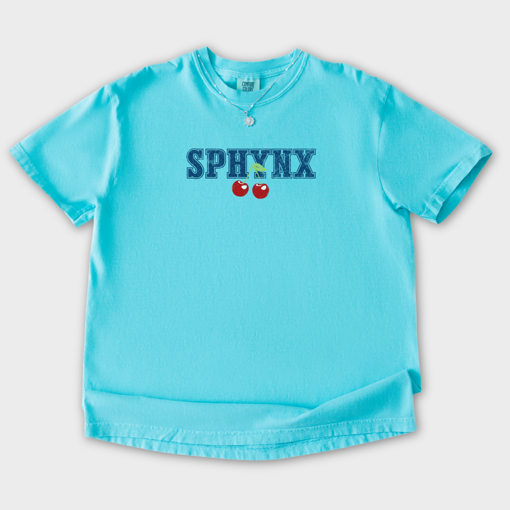sphynx-cherry-comfort-colors-t-shirt-in-lagoon-blue - Lagoon Blue Flat Lay Front