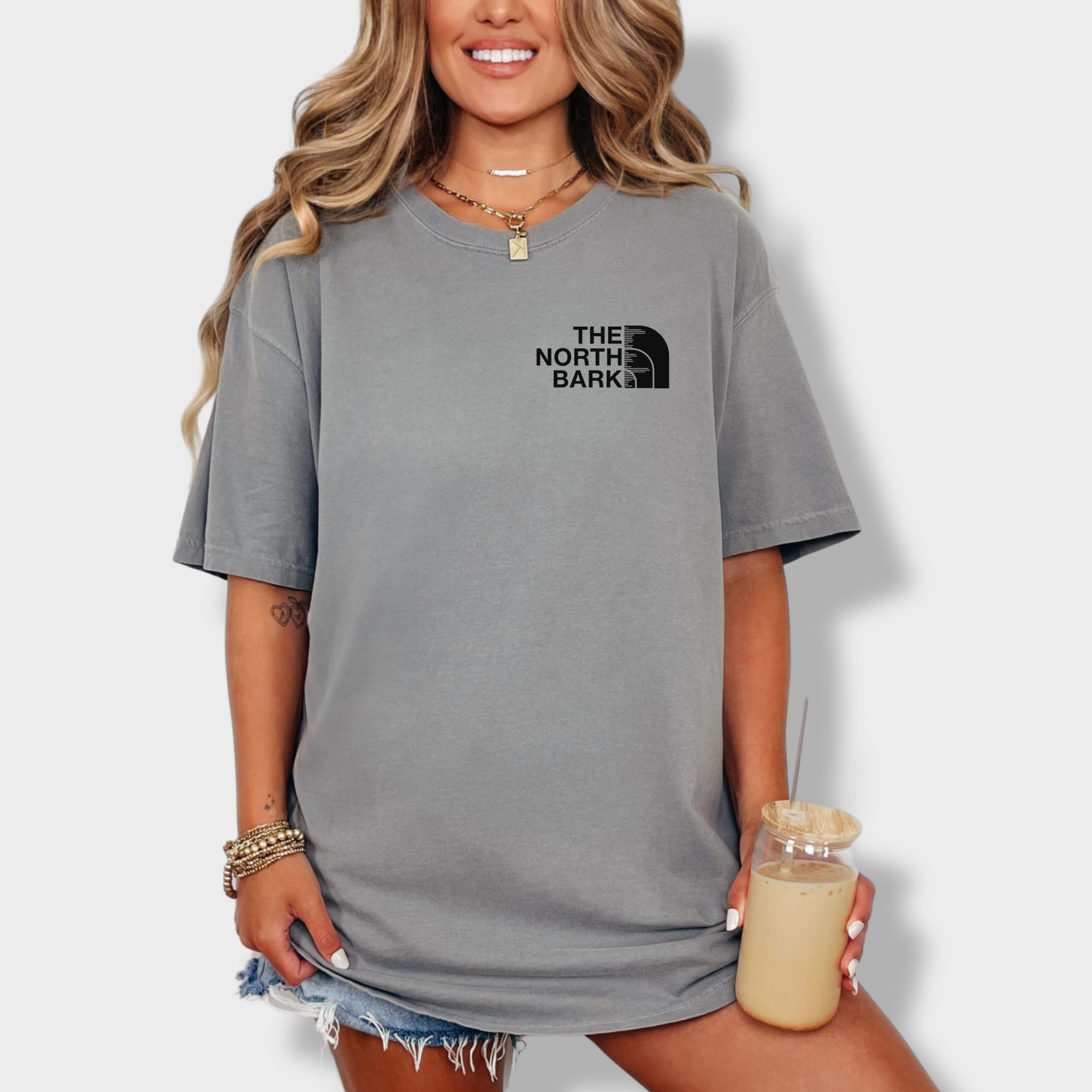 artistic-the-north-bark-dog-graphic-comfort-colors-t-shirt-in-grey - Grey Lifestyle Female Model