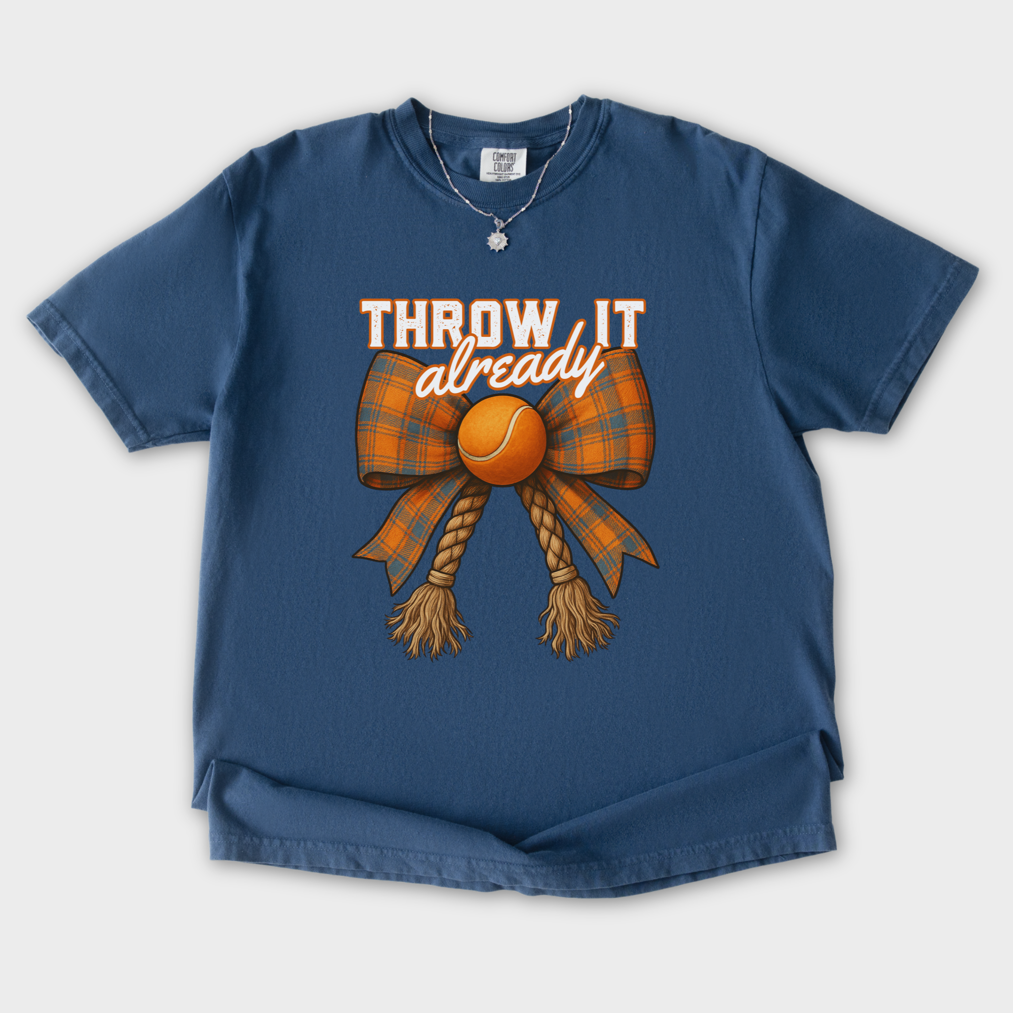 western-throw-it-already-dog-chew-toy-bow-dog-bow-comfort-colors-t-shirt-in-midnight - Midnight Flat Lay Front