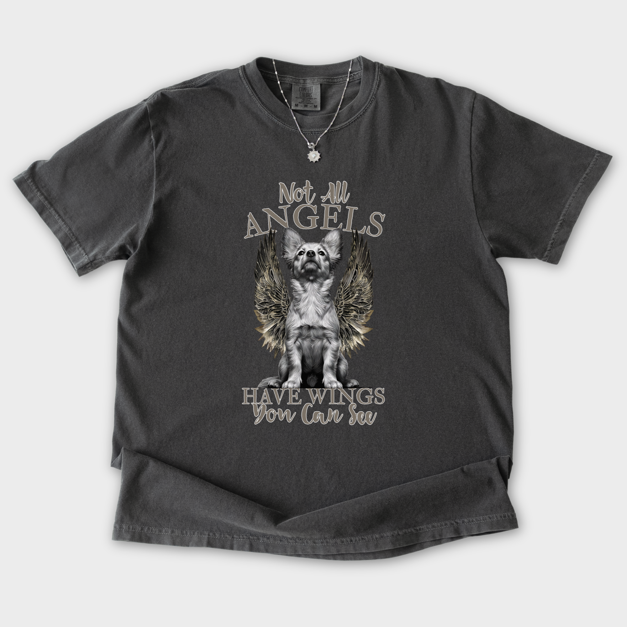 artistic-not-all-angels-have-wings-you-can-see-dog-graphic-comfort-colors-t-shirt-in-pepper - Pepper Flat Lay Front
