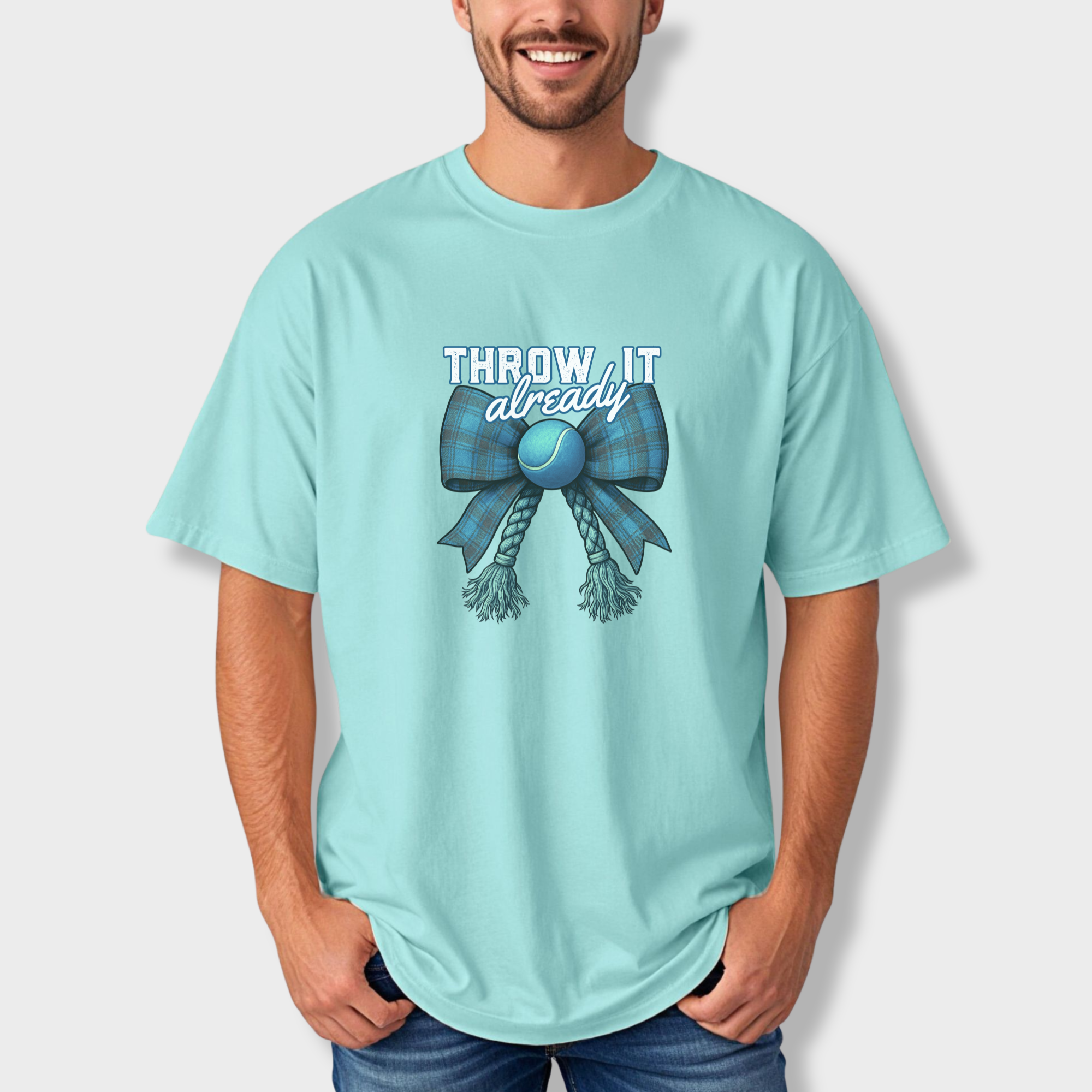 retro-throw-it-already-dog-chew-toy-bow-in-blue-dog-bow-comfort-colors-t-shirt-in-chalky-mint - Chalky Mint Lifestyle Male Model