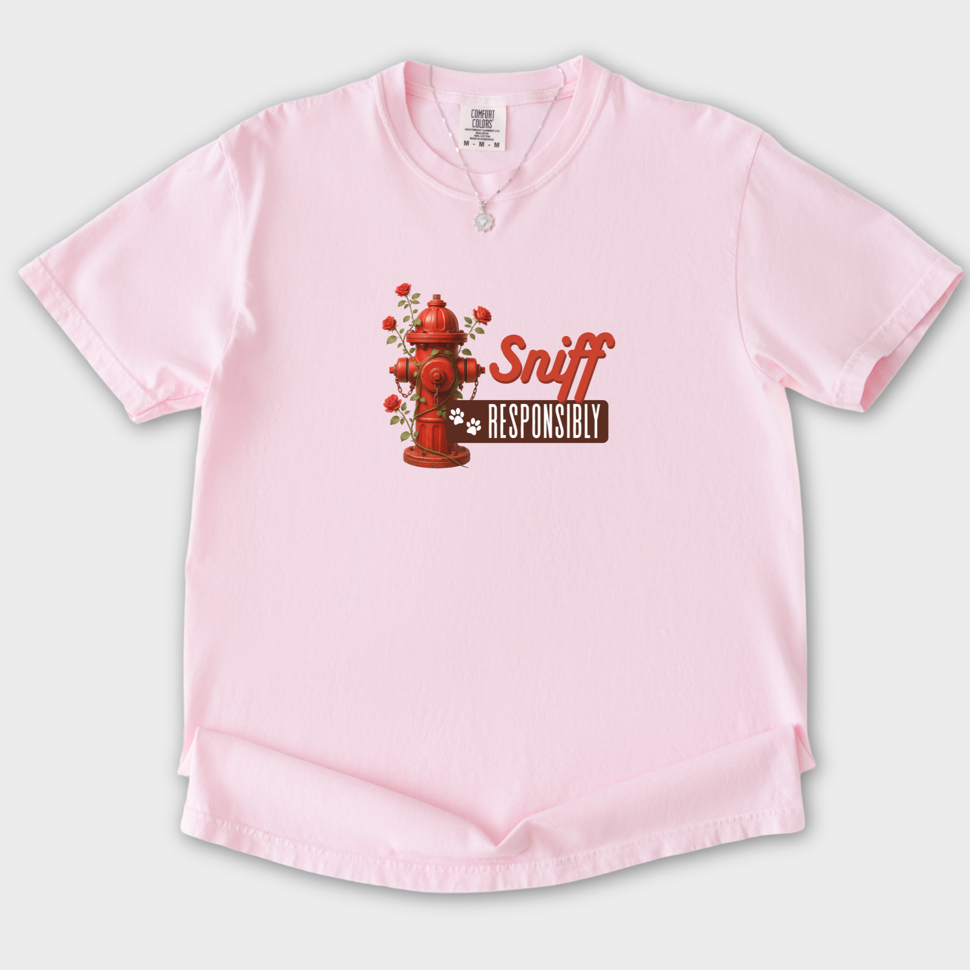 floral-sniff-responsibly-dog-graphic-comfort-colors-t-shirt-in-blossom - Blossom Flat Lay Front