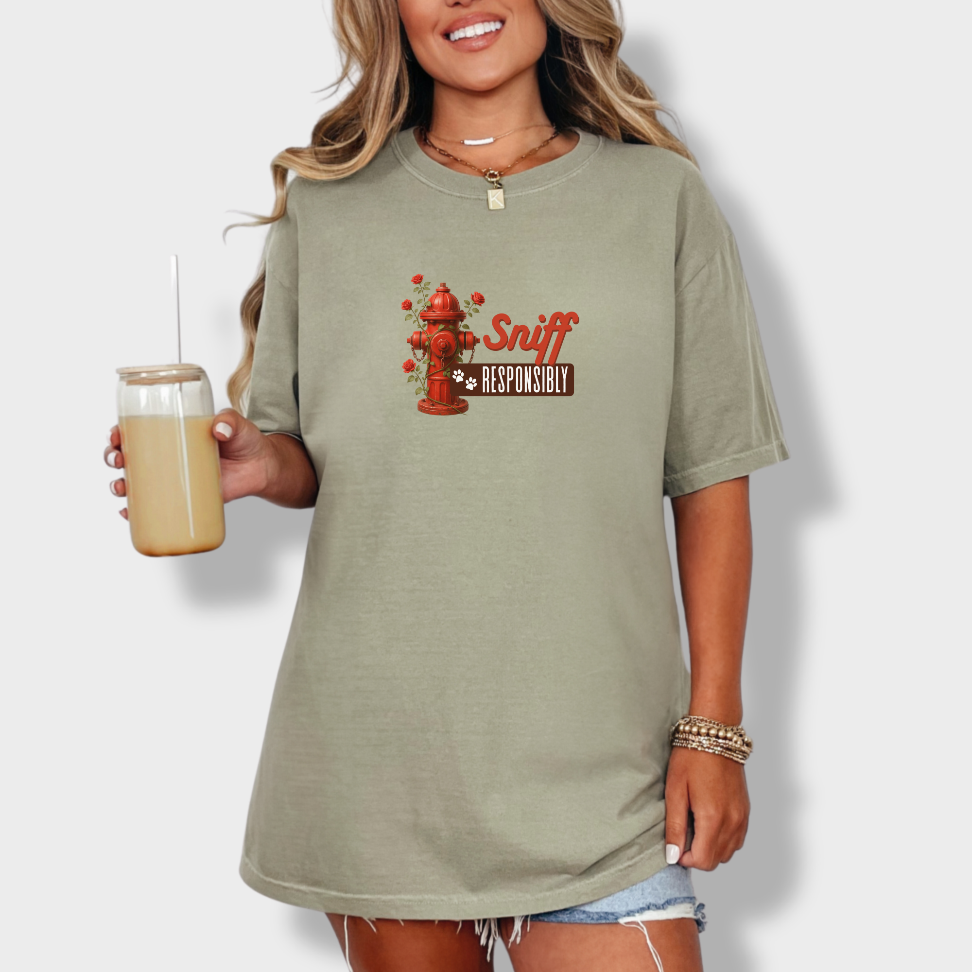 floral-sniff-responsibly-dog-graphic-comfort-colors-t-shirt-in-khaki - Khaki Lifestyle Female Model