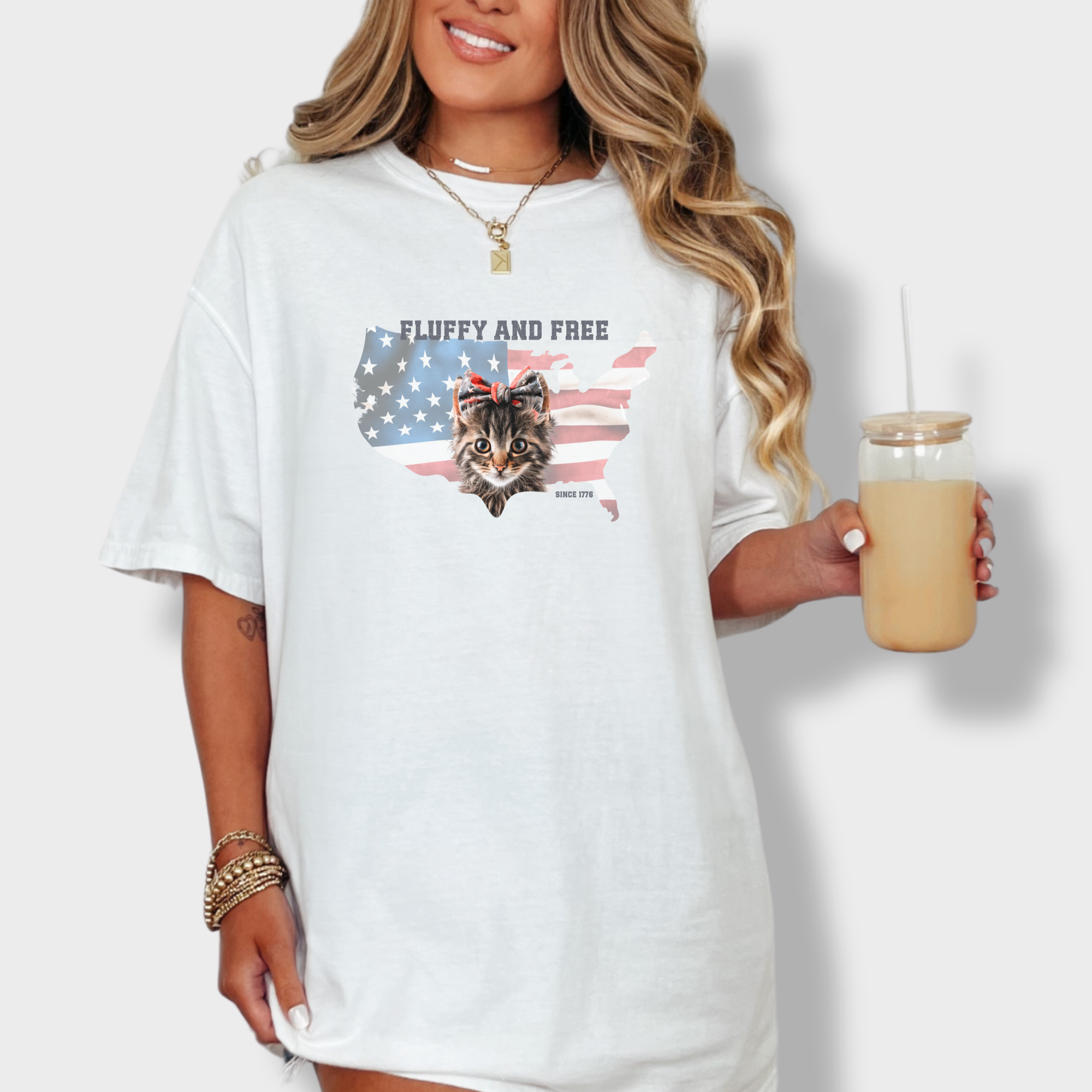 retro-fluffy-and-free-fourth-of-july-kitty-cat-graphic-comfort-colors-t-shirt-in-white - White Lifestyle Female Model