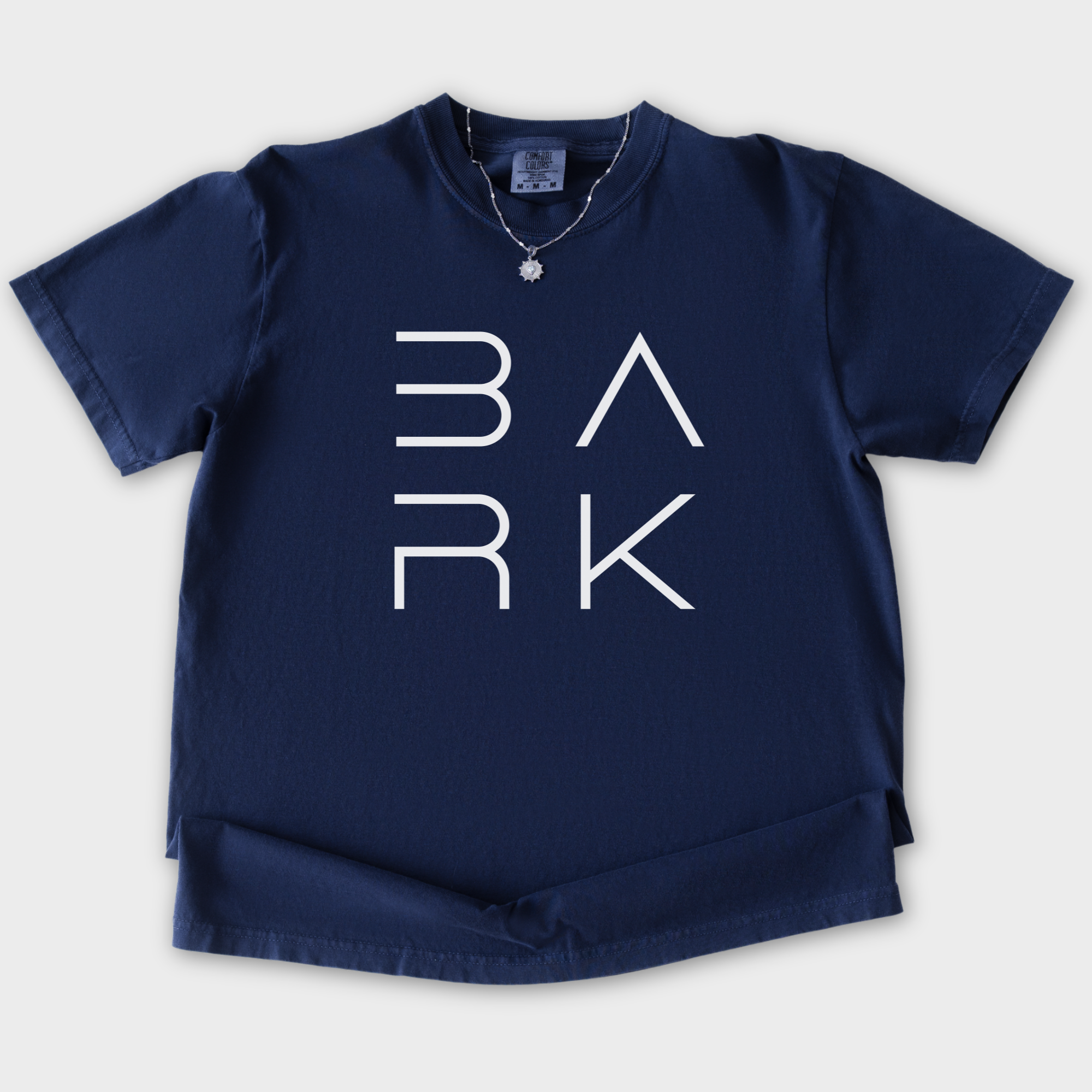 minimalist-bark-modern-text-design-dog-text-comfort-colors-t-shirt-in-true-navy - True Navy Flat Lay Front