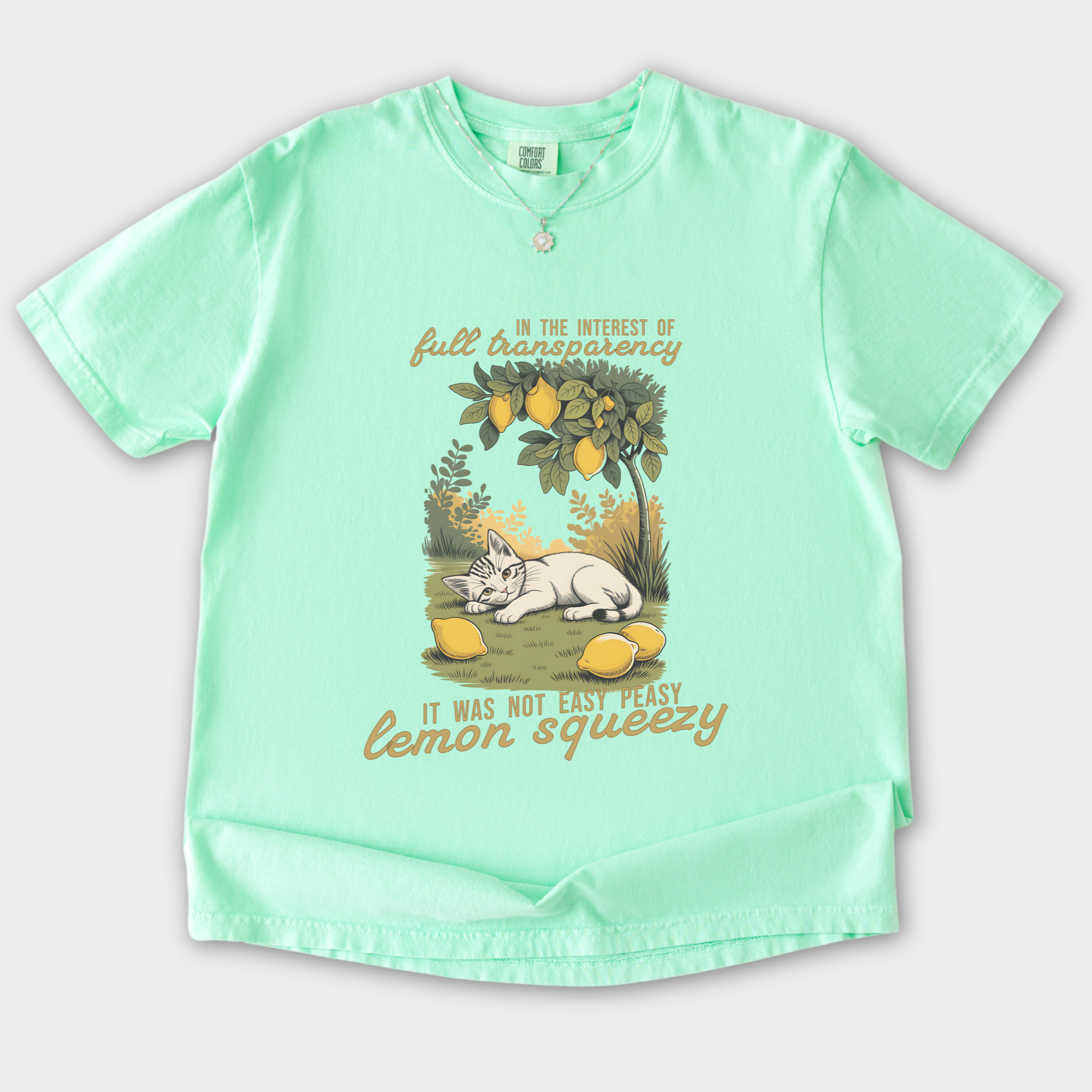 retro-not-so-easy-lemon-squeezy-cat-cat-graphic-comfort-colors-t-shirt-in-island-reef - Island Reef Flat Lay Front