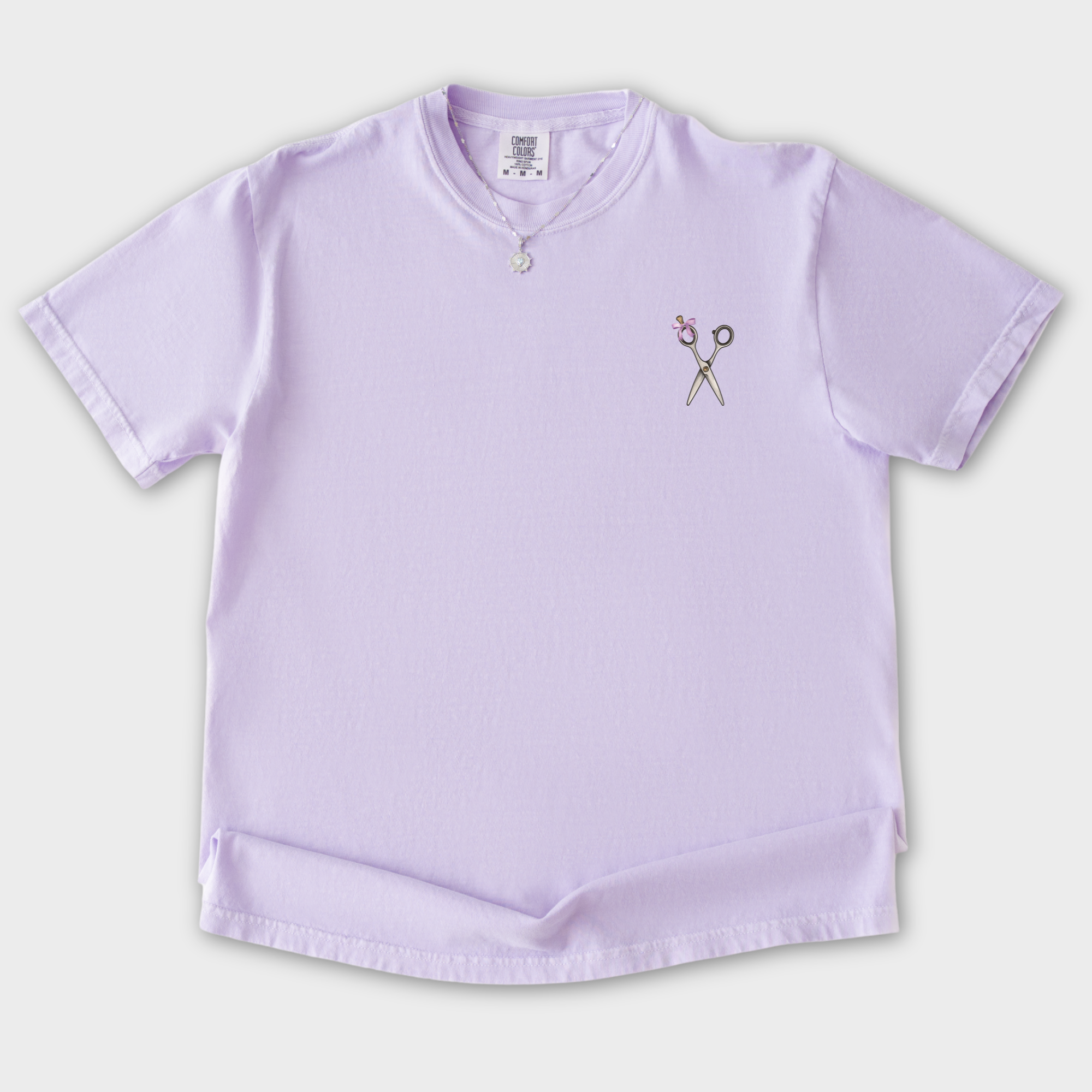 artistic-groomer-fluff-brush-stroke-dog-graphic-comfort-colors-t-shirt-in-orchid - Orchid Flat Lay Front