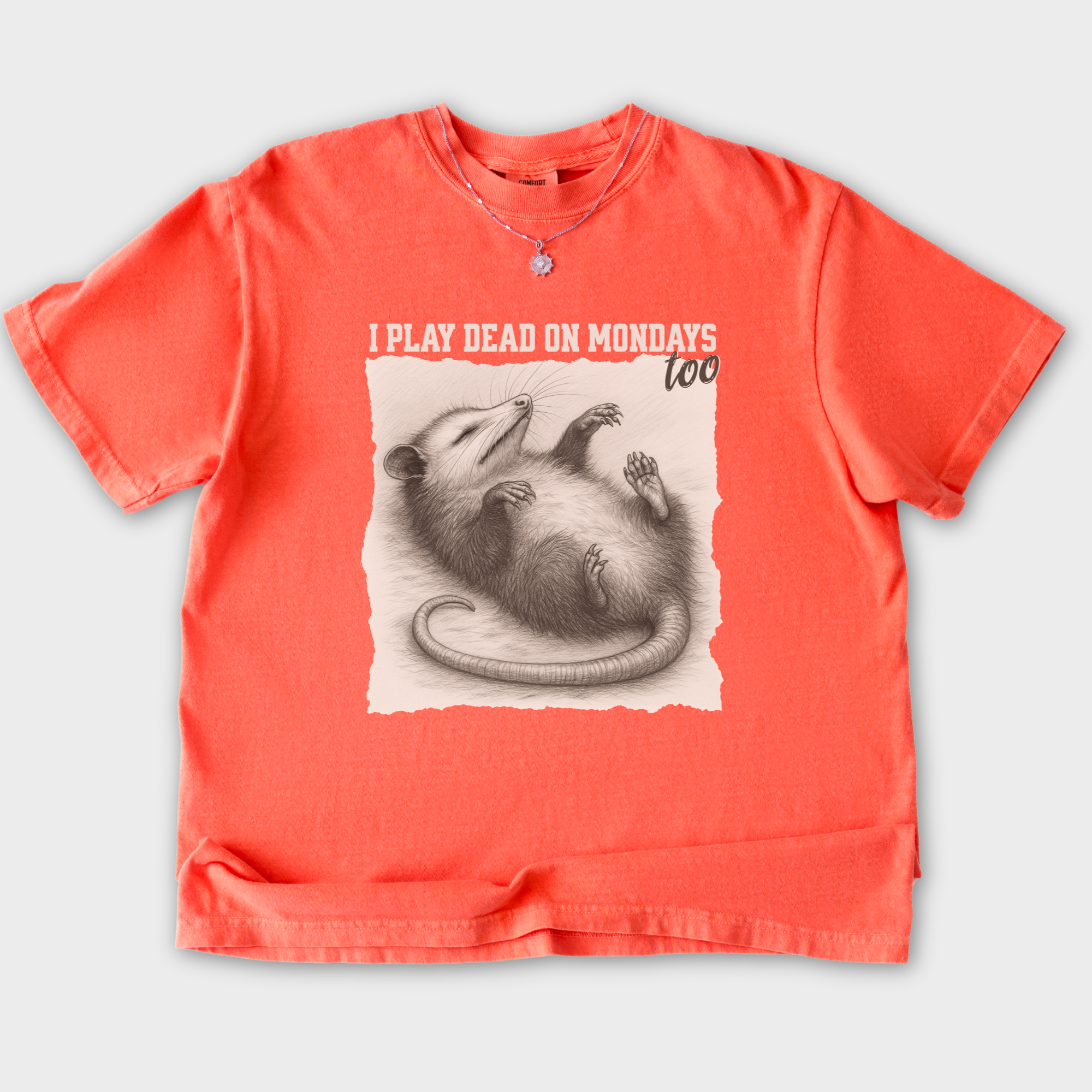 western-i-play-dead-on-mondays-too-feral-line-art-comfort-colors-t-shirt-in-bright-salmon - Bright Salmon Flat Lay Front
