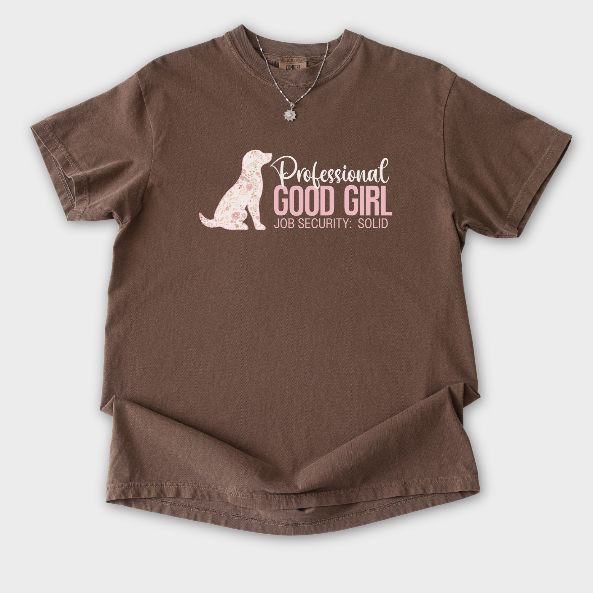 floral-professional-good-girl-solid-job-security-dog-graphic-comfort-colors-t-shirt-in-espresso - Espresso Flat Lay Front