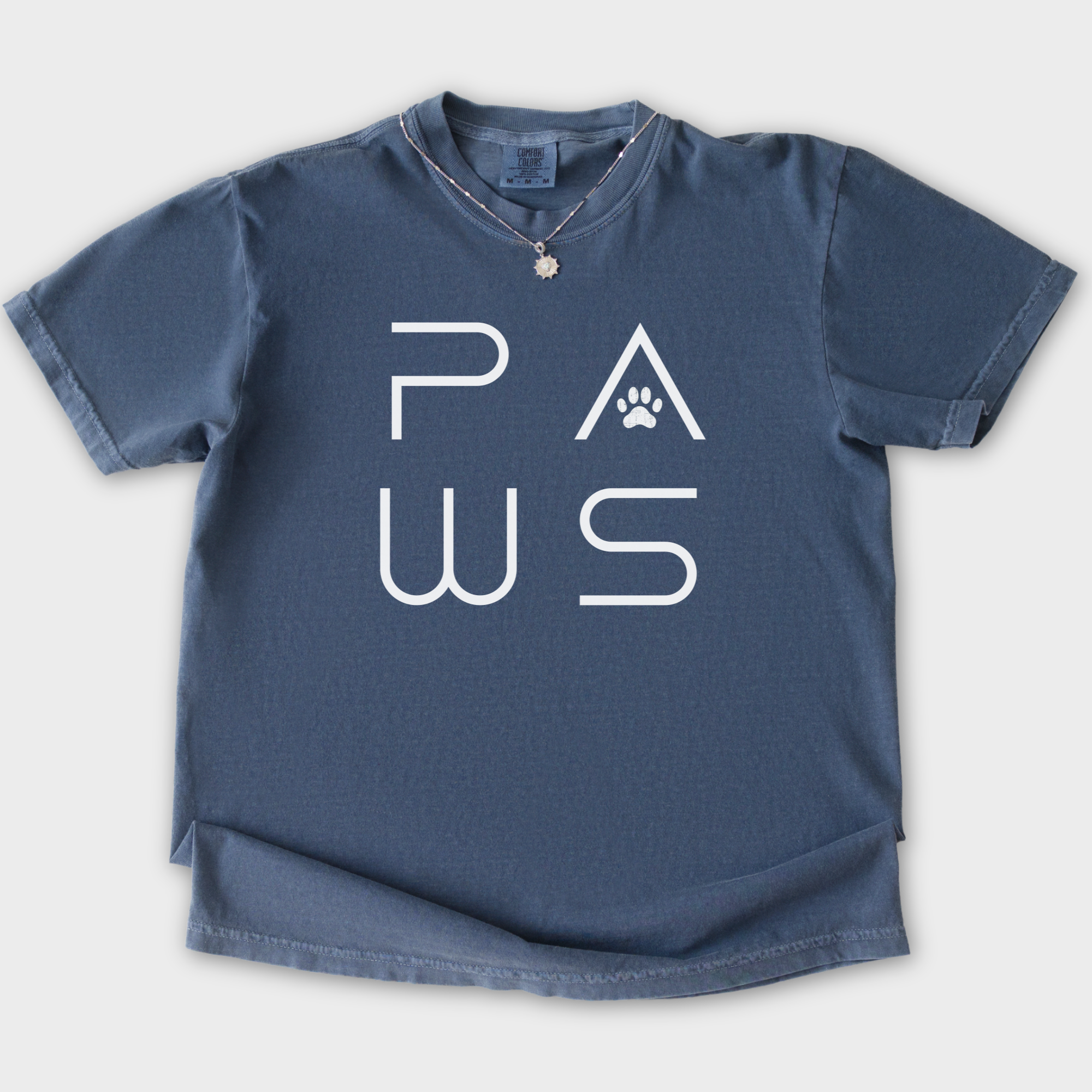 minimalist-paws-modern-text-design-pet-text-comfort-colors-t-shirt-in-denim - Denim Flat Lay Front