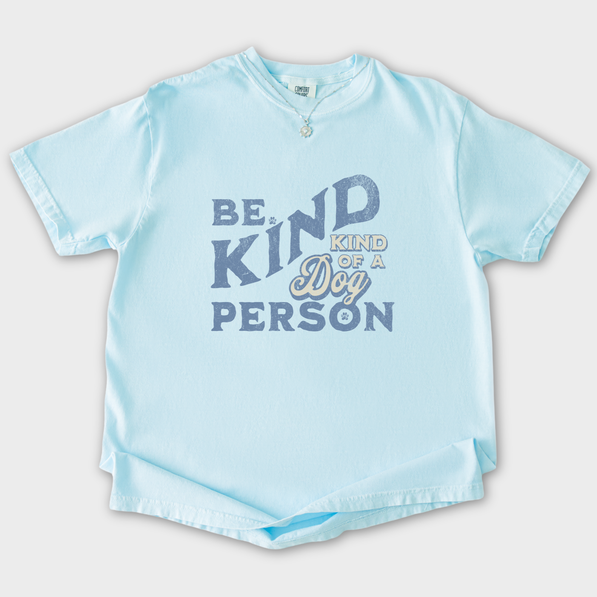 vintage-be-kind-of-a-dog-person-dog-text-comfort-colors-t-shirt-in-chambray - Chambray Flat Lay Front