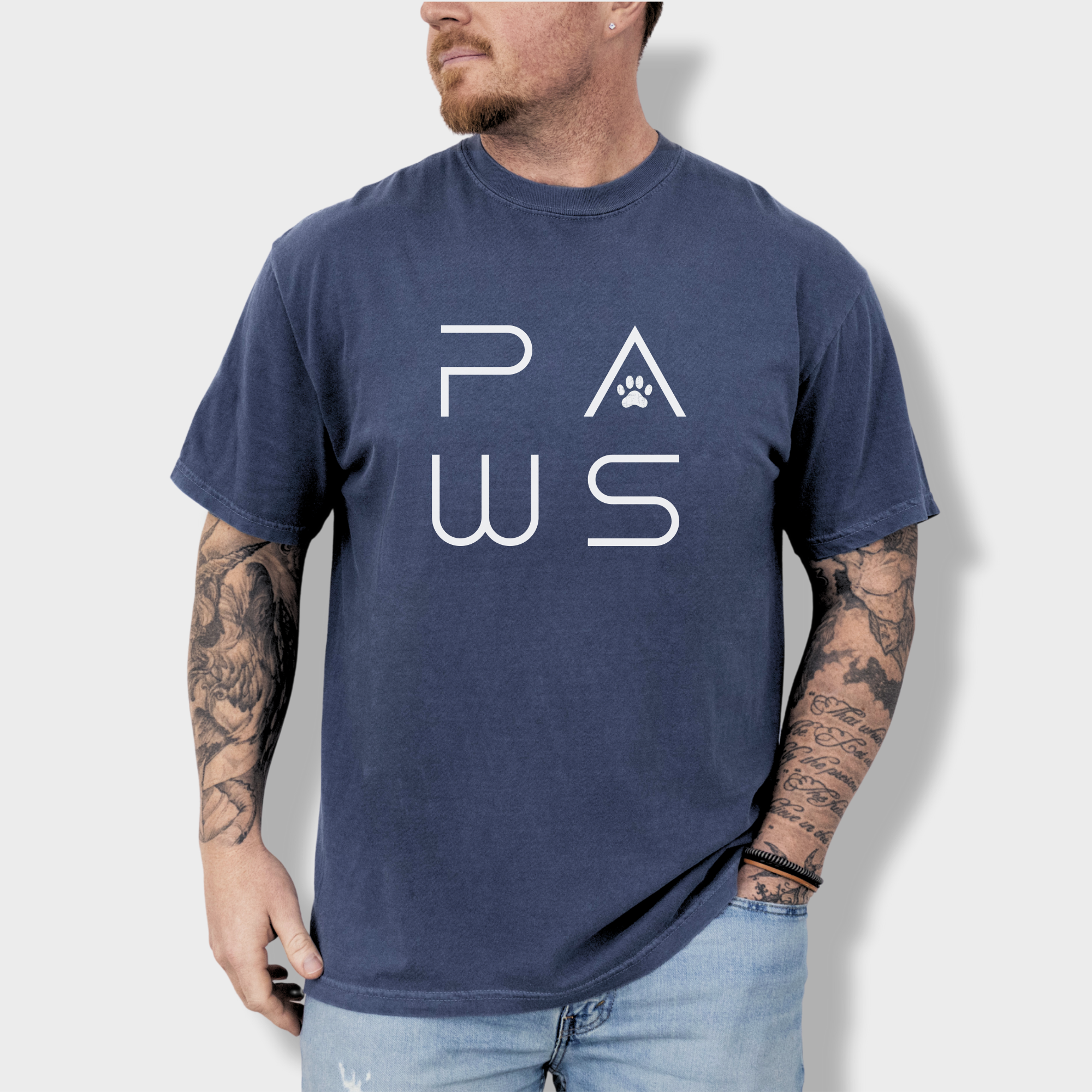 minimalist-paws-modern-text-design-pet-text-comfort-colors-t-shirt-in-denim - Denim Lifestyle Male Model