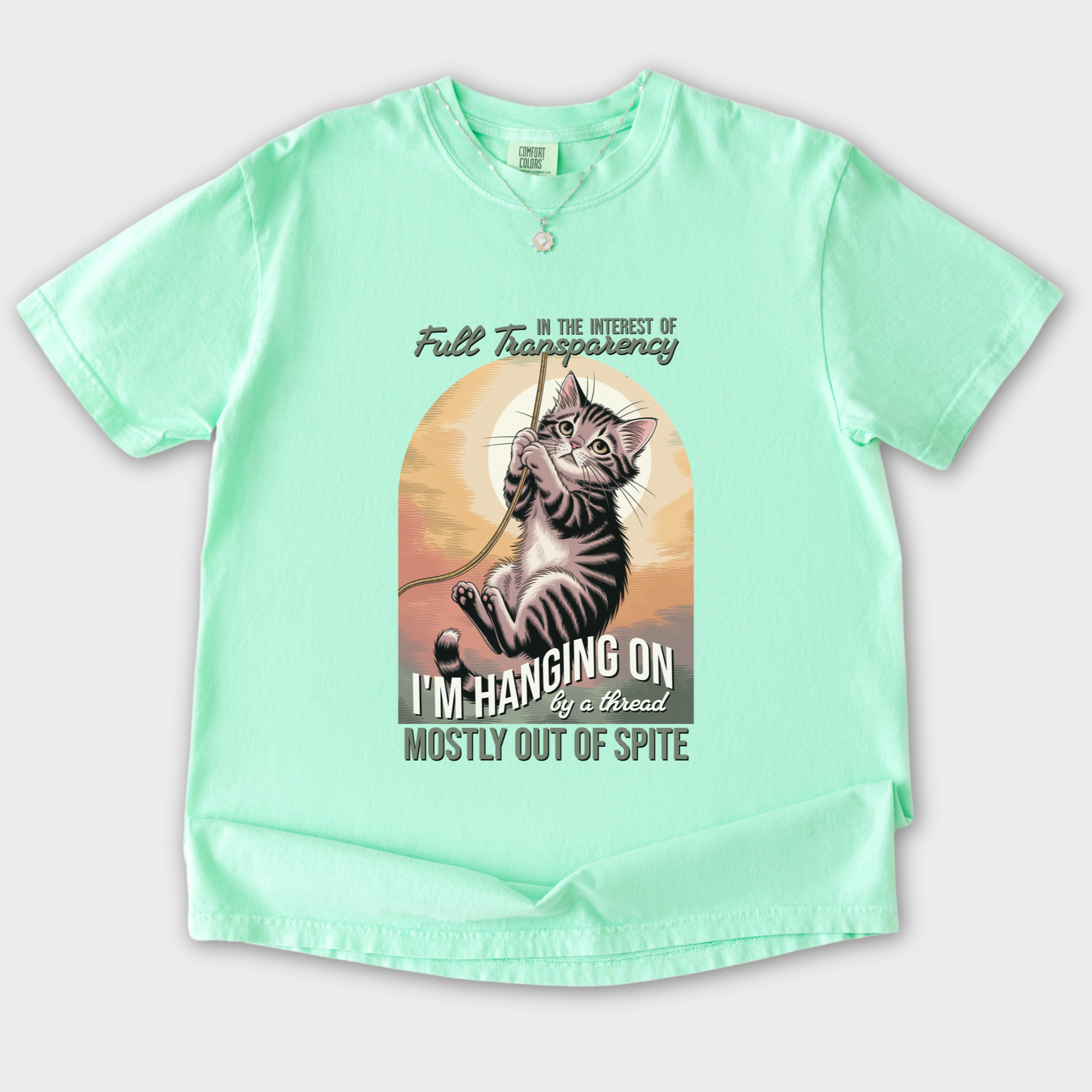 western-hanging-on-by-a-thread-cat-graphic-comfort-colors-t-shirt-in-island-reef - Island Reef Flat Lay Front