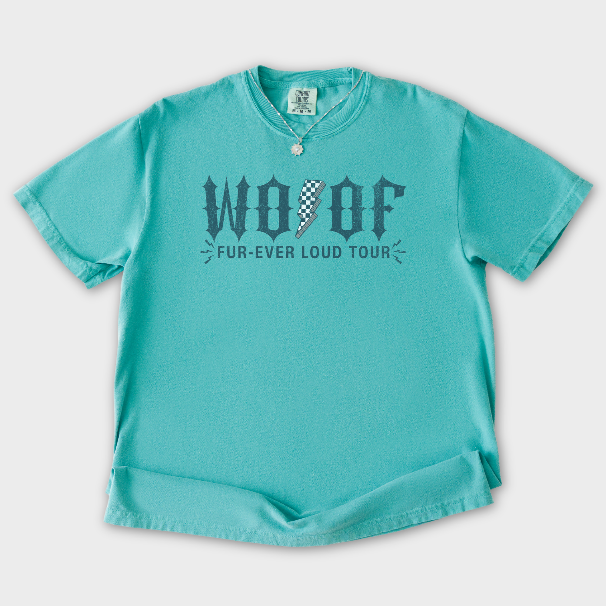 artistic-woof-furever-loud-tour-dog-graphic-comfort-colors-t-shirt-in-seafoam - Seafoam Flat Lay Front