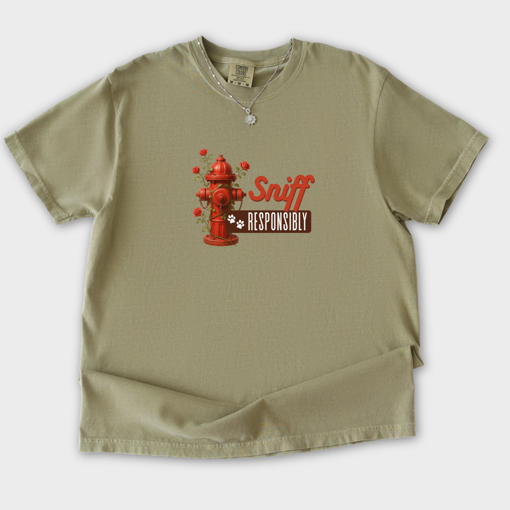 floral-sniff-responsibly-dog-graphic-comfort-colors-t-shirt-in-khaki - Khaki Flat Lay Front