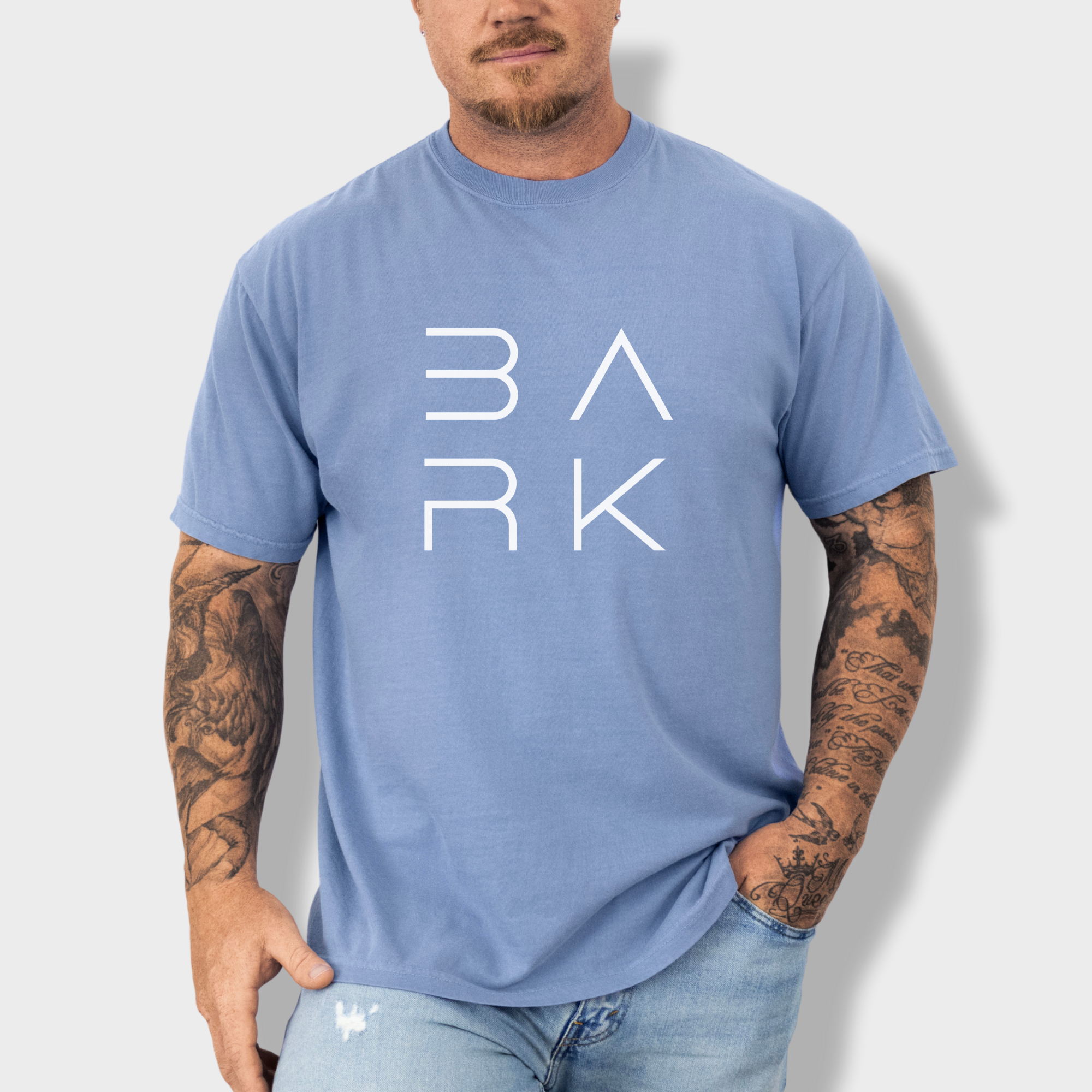 minimalist-bark-modern-text-design-dog-text-comfort-colors-t-shirt-in-washed-denim - Washed Denim Lifestyle Male Model