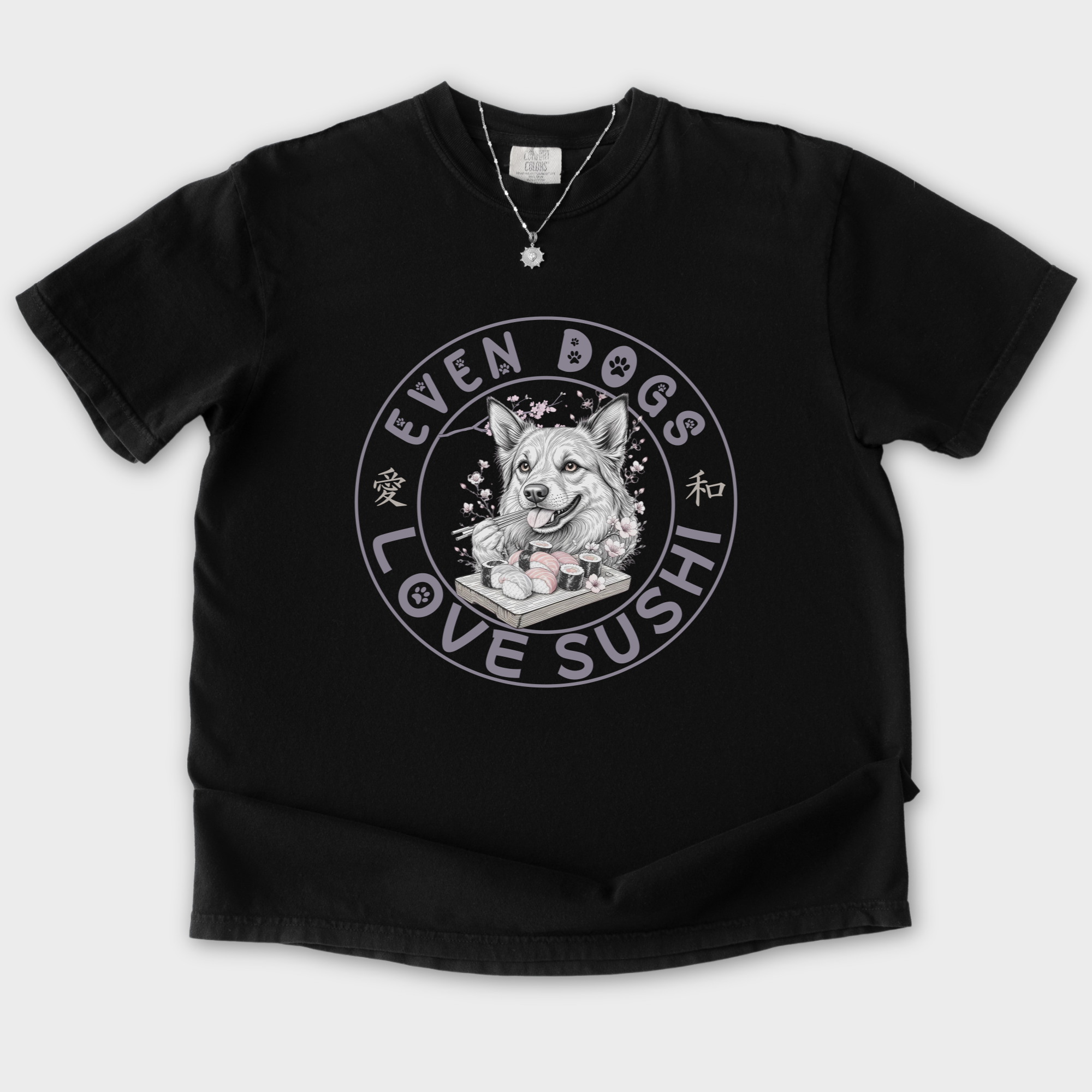 floral-even-dogs-love-sushi-plus-cherry-blossoms-dog-graphic-comfort-colors-t-shirt-in-black - Black Flat Lay Front