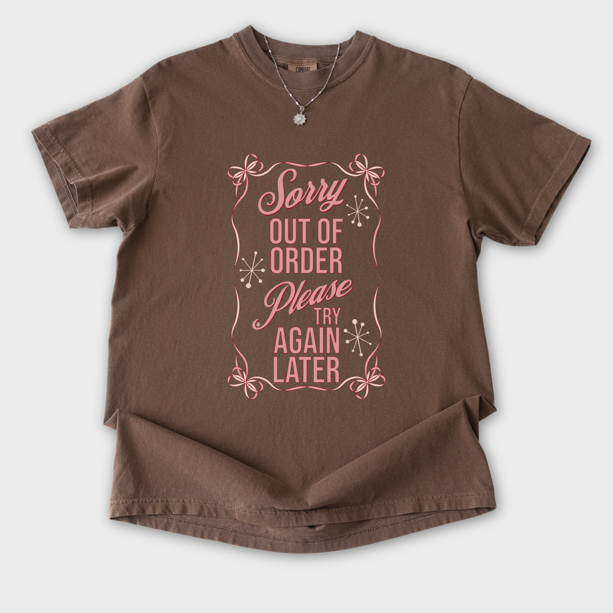 minimalist-sorry-out-of-order-please-try-again-later-feral-bow-comfort-colors-t-shirt-in-espresso - Espresso Flat Lay Front