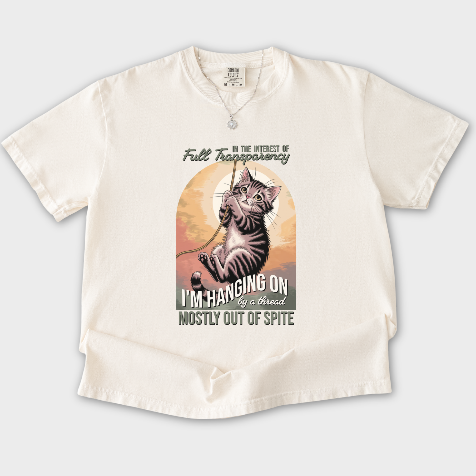 western-hanging-on-by-a-thread-cat-graphic-comfort-colors-t-shirt-in-ivory - Ivory Flat Lay Front