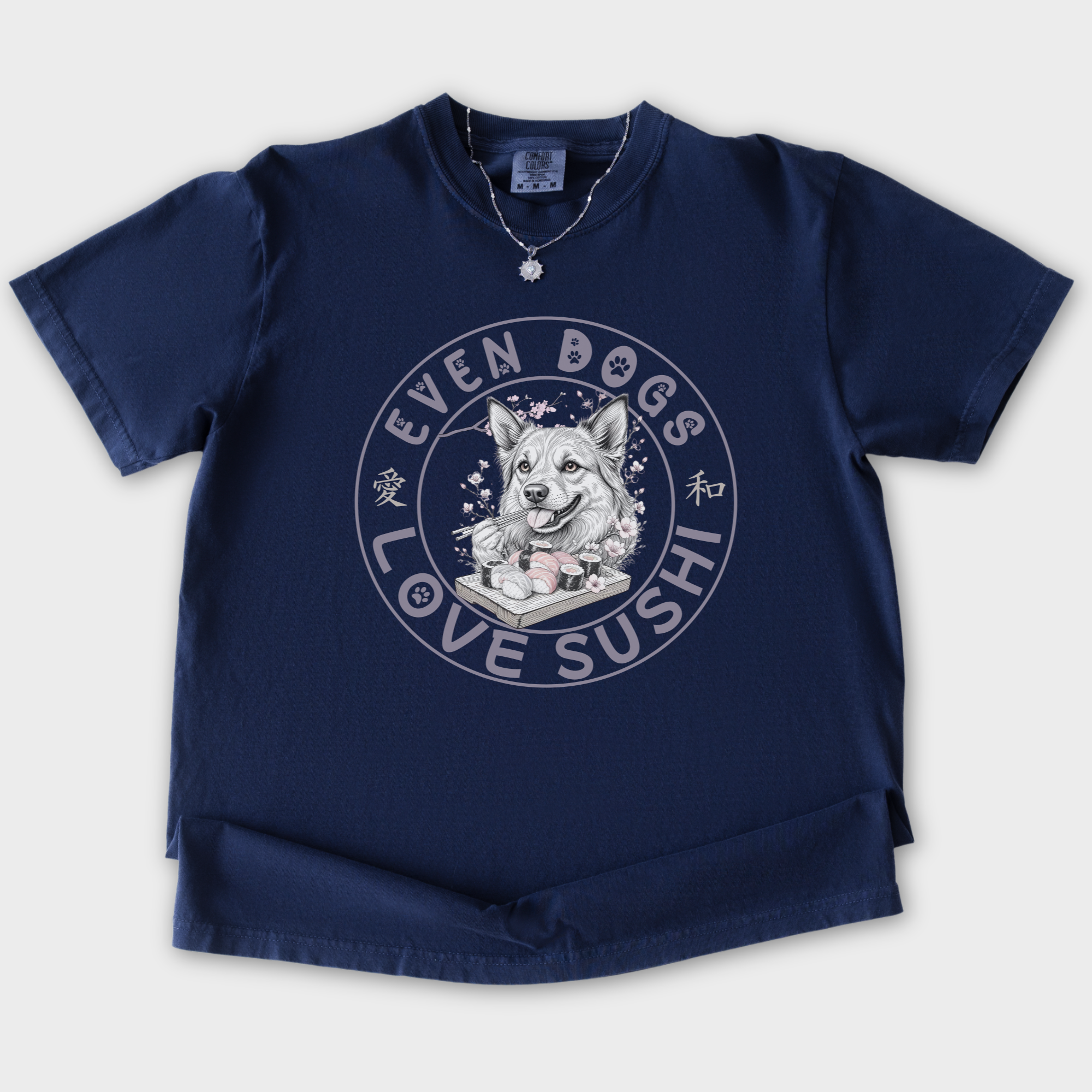 floral-even-dogs-love-sushi-plus-cherry-blossoms-dog-graphic-comfort-colors-t-shirt-in-true-navy - True Navy Flat Lay Front