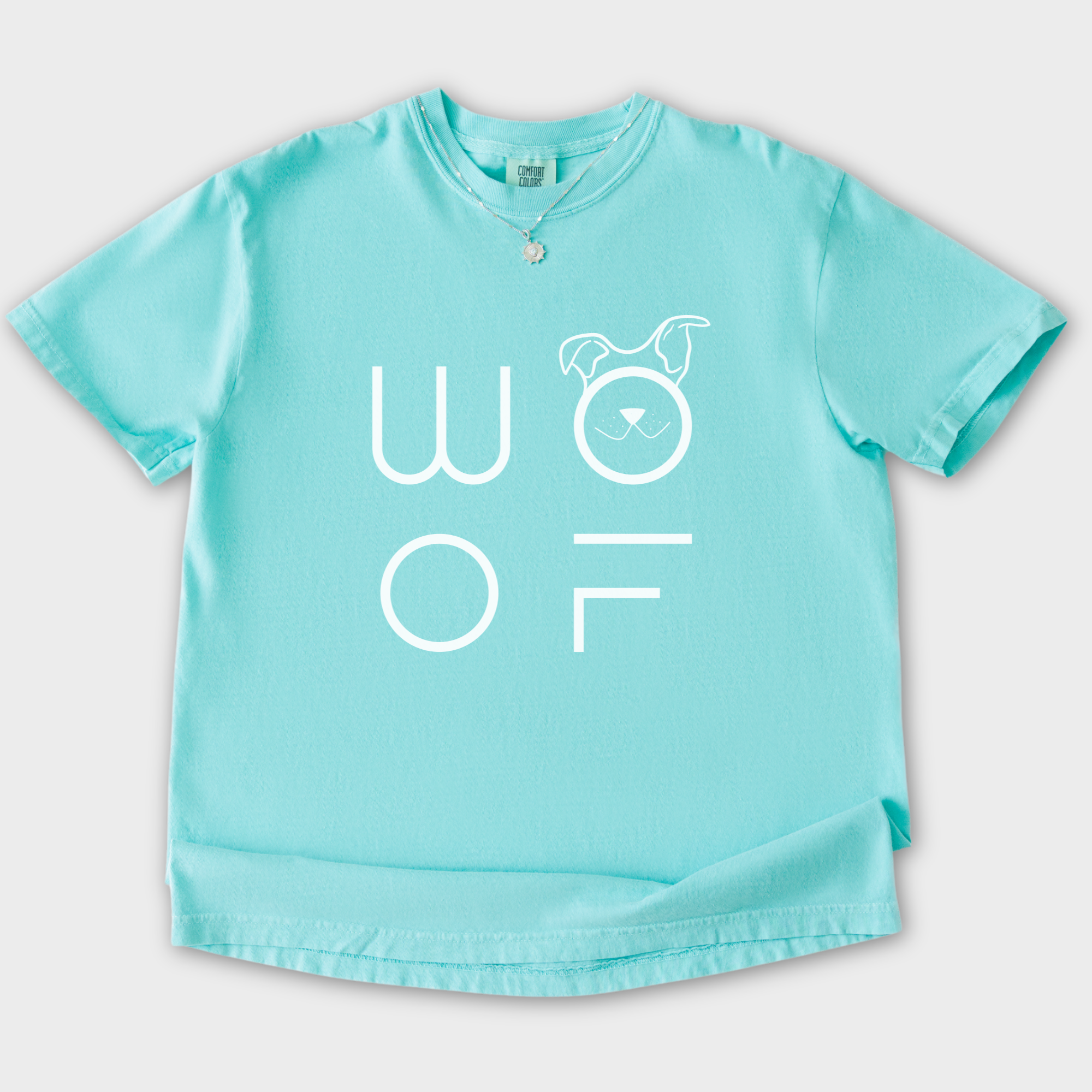 minimalist-woof-modern-text-design-dog-text-comfort-colors-t-shirt-in-chalky-mint - Chalky Mint Flat Lay Front