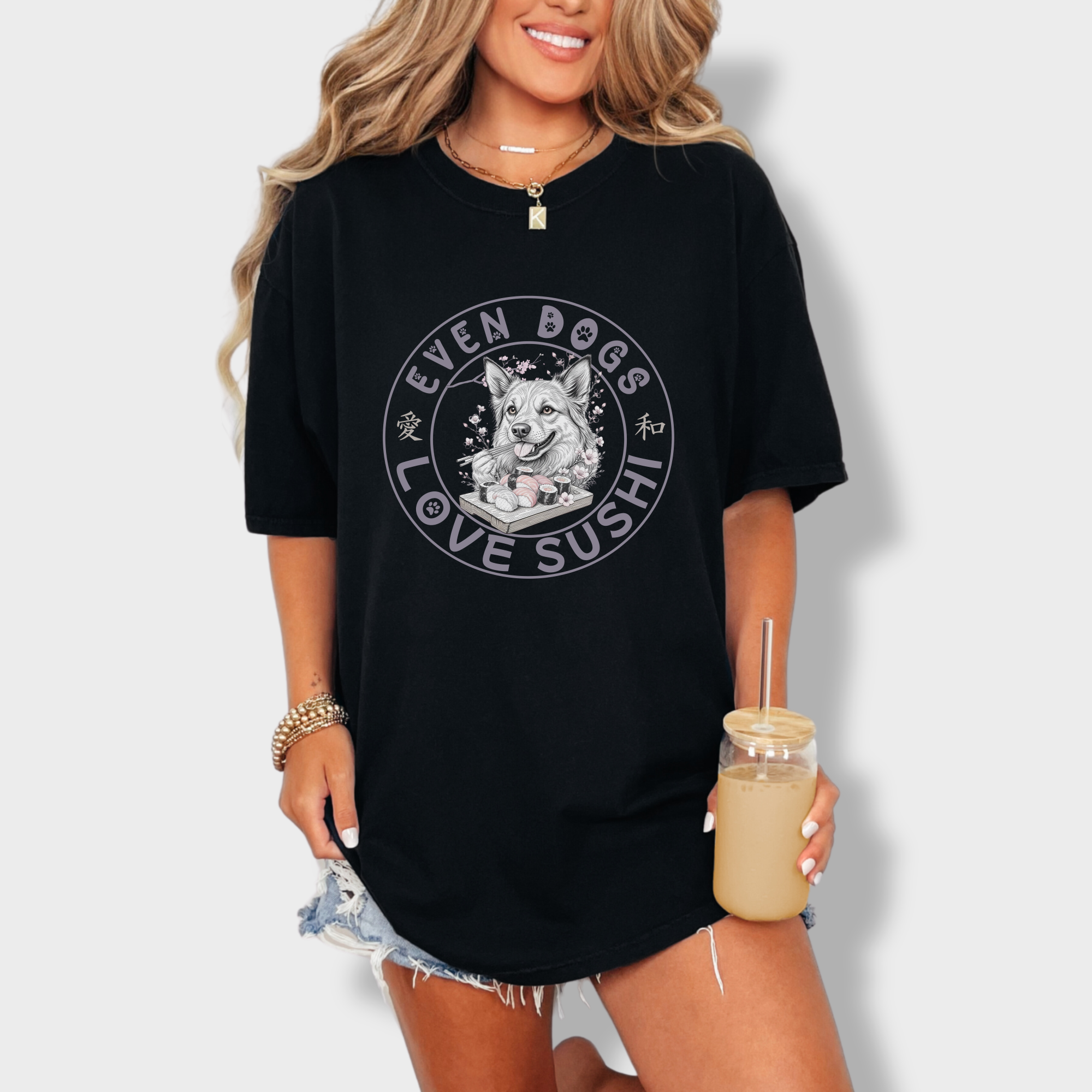 floral-even-dogs-love-sushi-plus-cherry-blossoms-dog-graphic-comfort-colors-t-shirt-in-black - Black Lifestyle Female Model